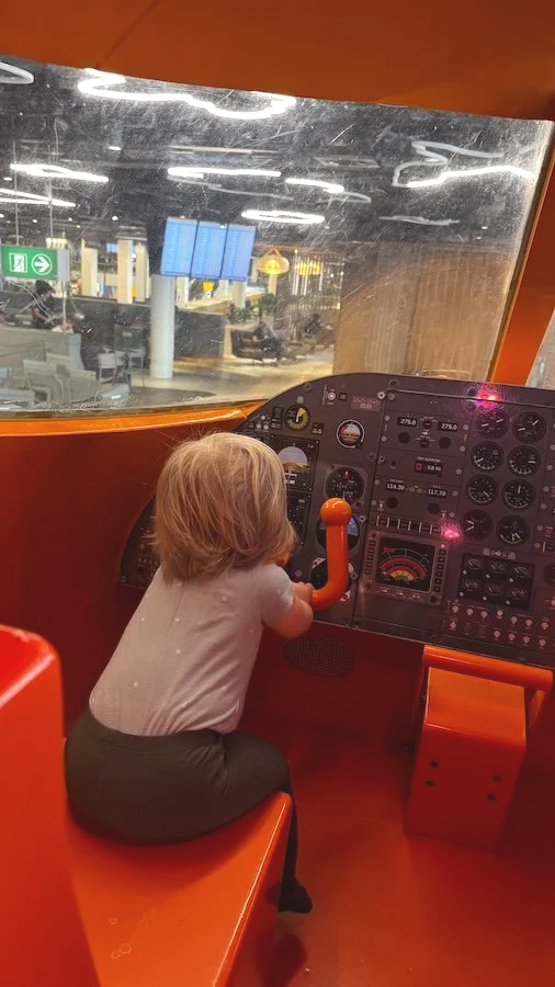 toddler-inside-play-airplane.png