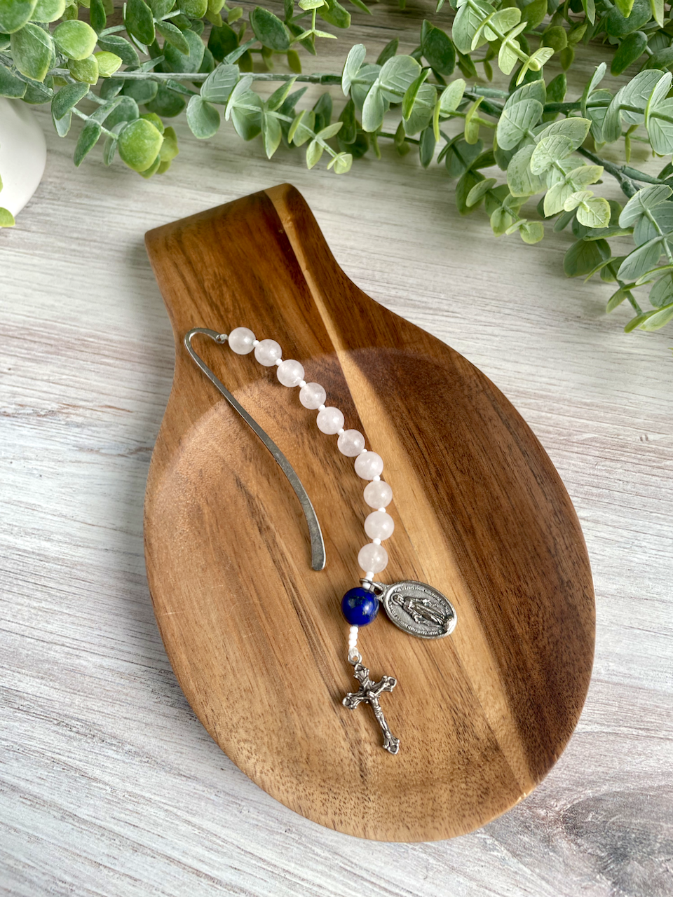 Gemstone bookmark with a decade's worth of rosary beads, miraculous medal, and small crucifix. Blue Our Father bead.