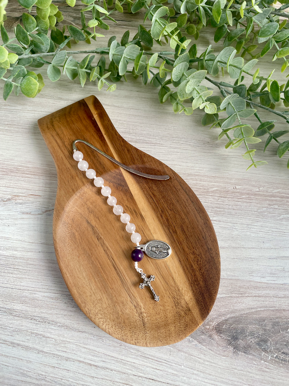 Gemstone bookmark with a decade's worth of rosary beads, miraculous medal, and small crucifix. Purple Our Father bead.