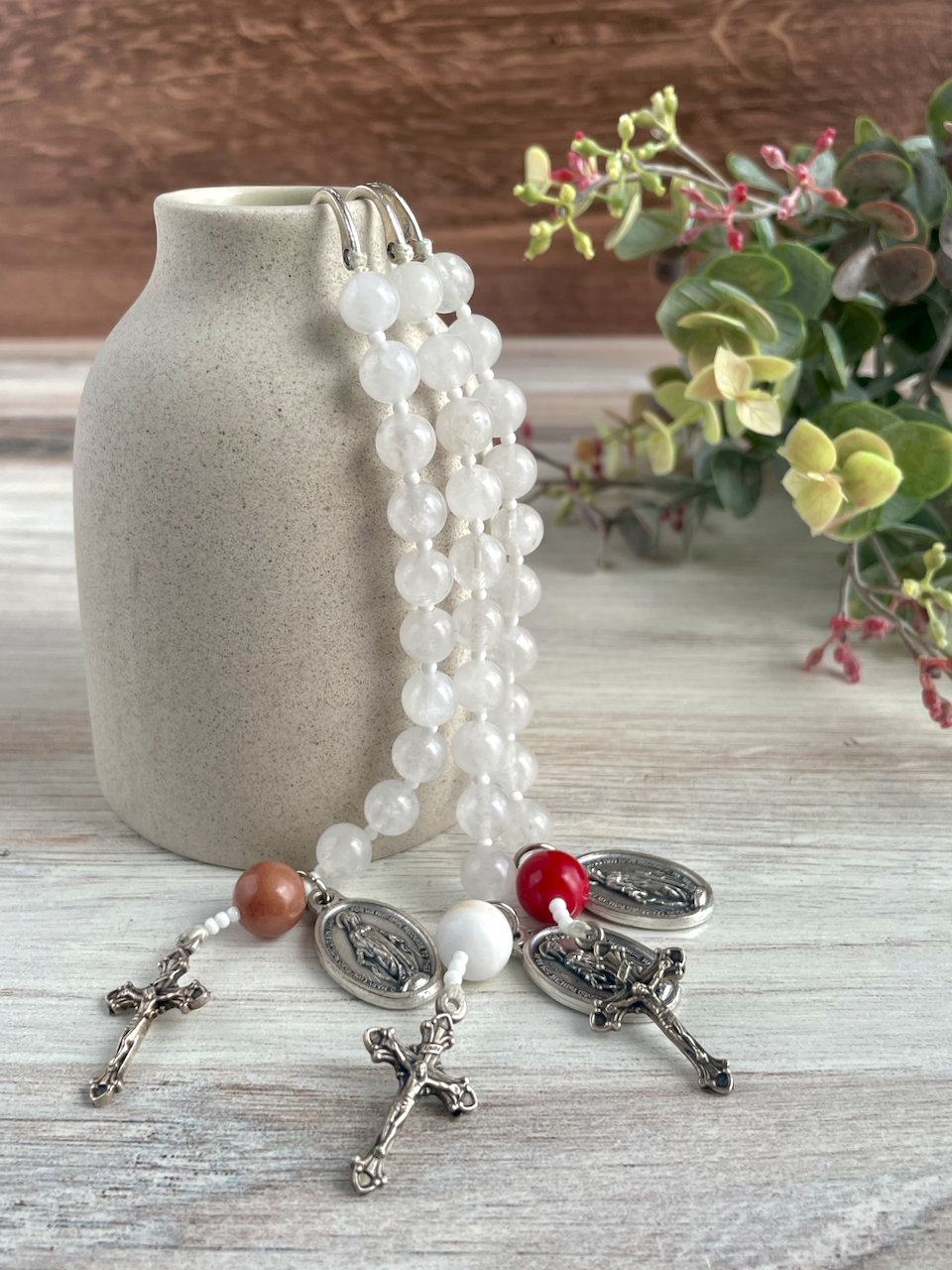Trio of gemstone bookmarks with a decade's worth of rosary beads, miraculous medal, and small crucifix. Red, white, and brown Our Father beads.