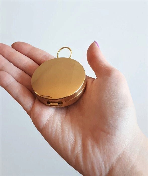 compass+closed+in+hand.jpeg