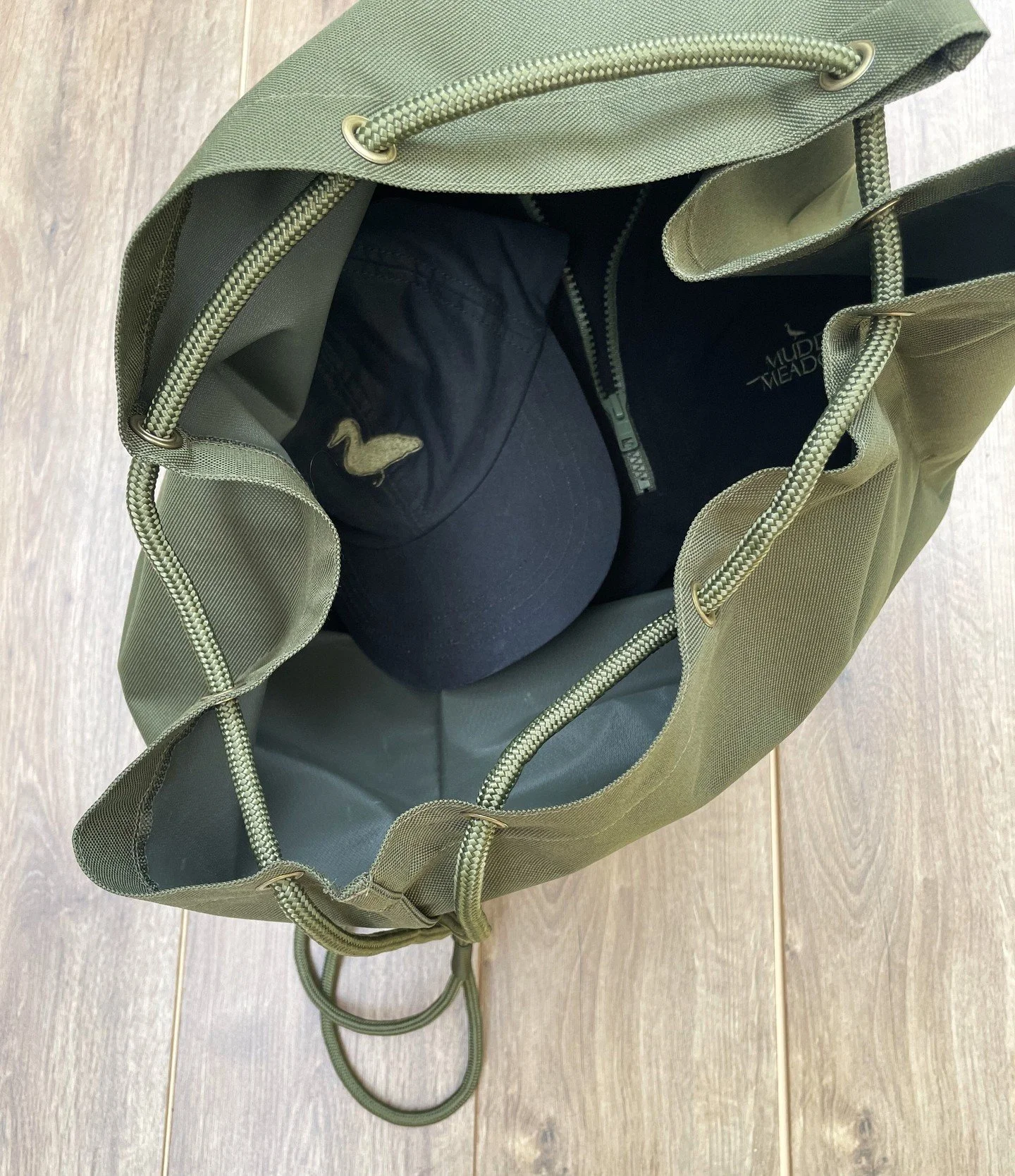 July is the month for easy days out &mdash; swims, shaded walks, long afternoons that turn into evenings. Here&rsquo;s what earns a place in the Duffel Bag when the temperature climbs.

&bull; Waxed Cotton Cap &mdash; keeps the sun off, handles sudde