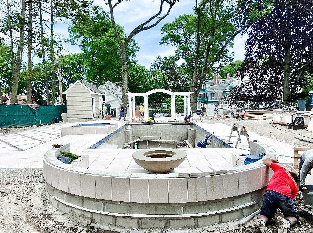 Gorgeous custom pool, spa, fire pit and patio design coming along nicely. Each and every stone is hand cut and set by Rob &amp; Zachary.