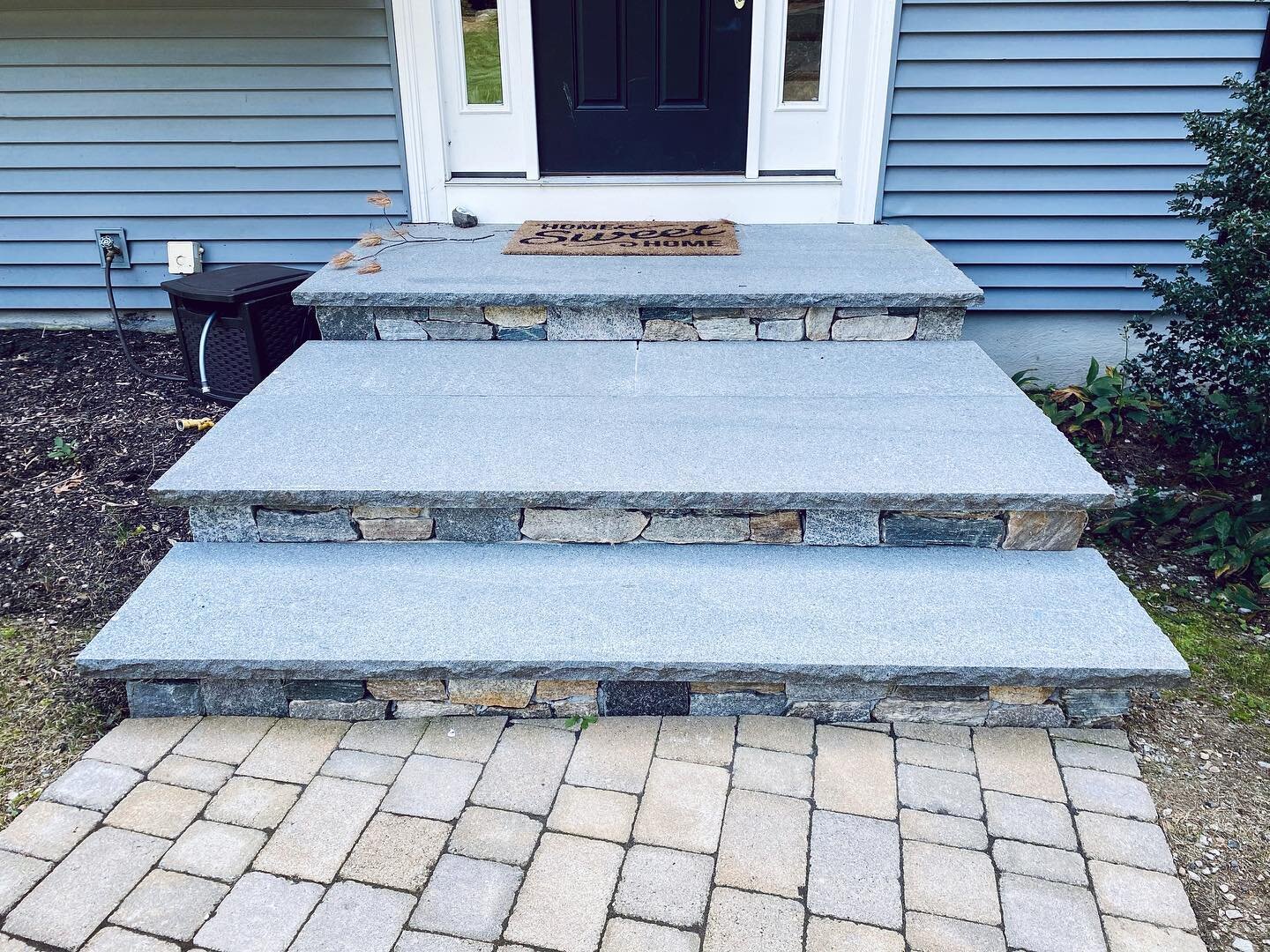 Blue mist granite cap with stone veneer steps and paver walk way to replace weathered brick