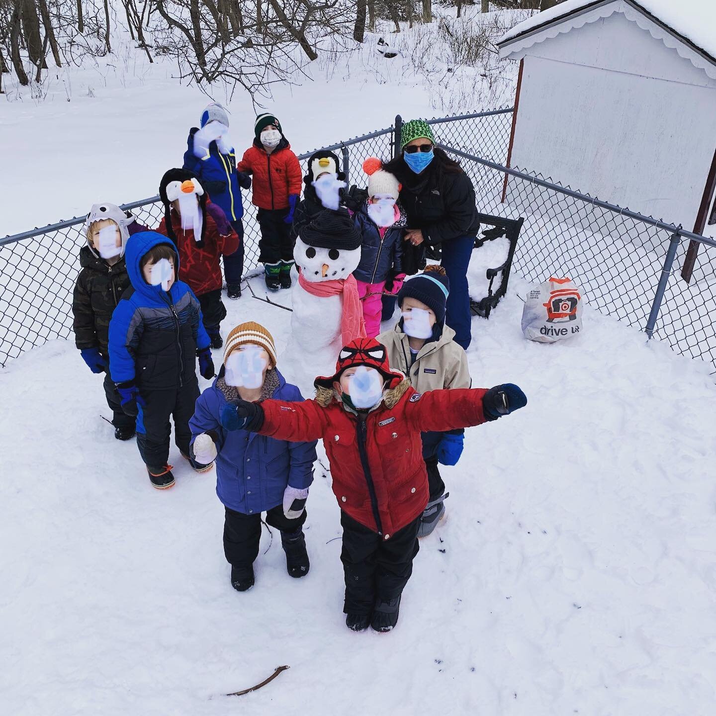 A fun day exploring the snow and building a class snowman!