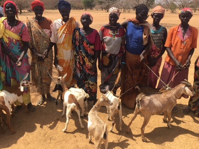 Women with their goats 2.jpg