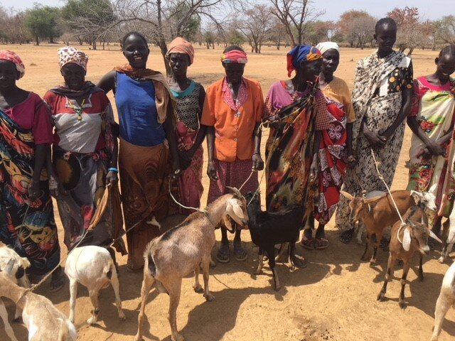 Women with their goats.jpg