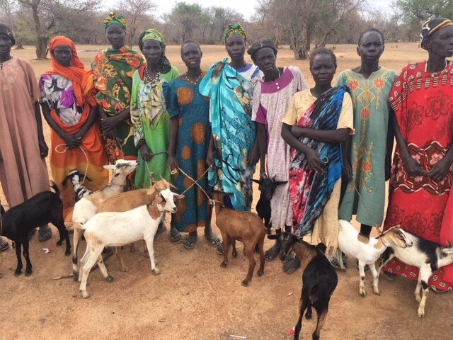Women with goats.jpg