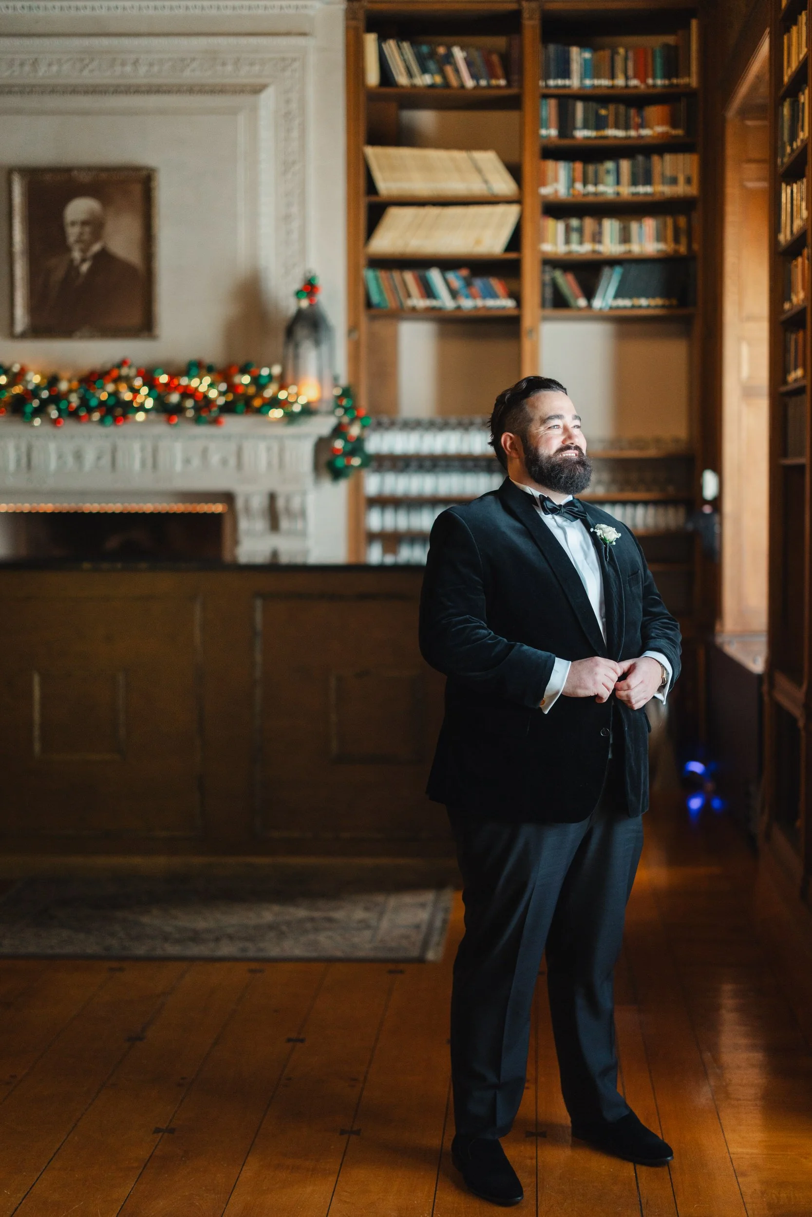 Groom prepares for his winter wedding at Aldrich Mansion