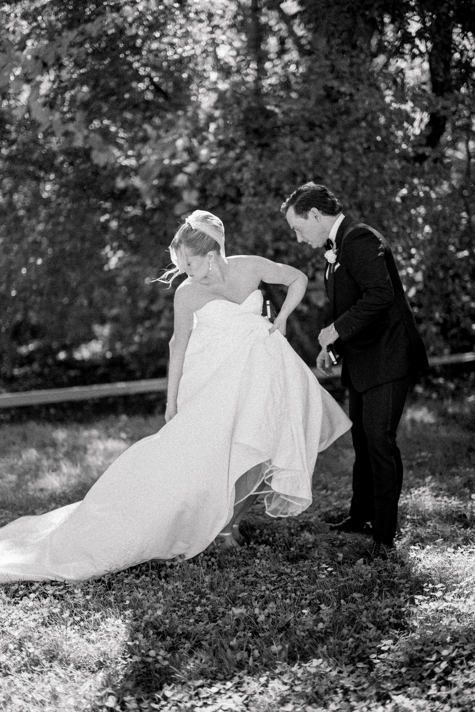 Candid first look photographs captured before an outdoor wedding ceremony on Cape Cod.