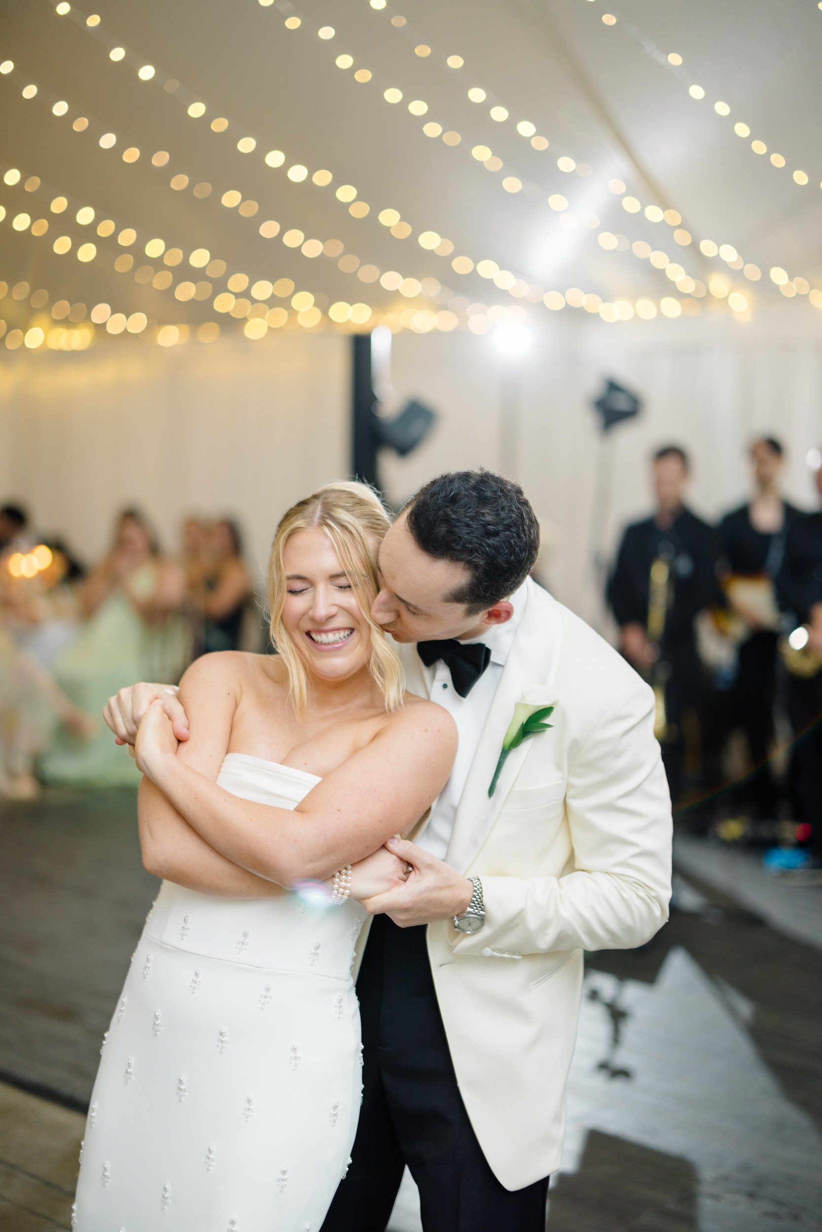 Bride and groom dancing during their reception at Blithewold Mansion.