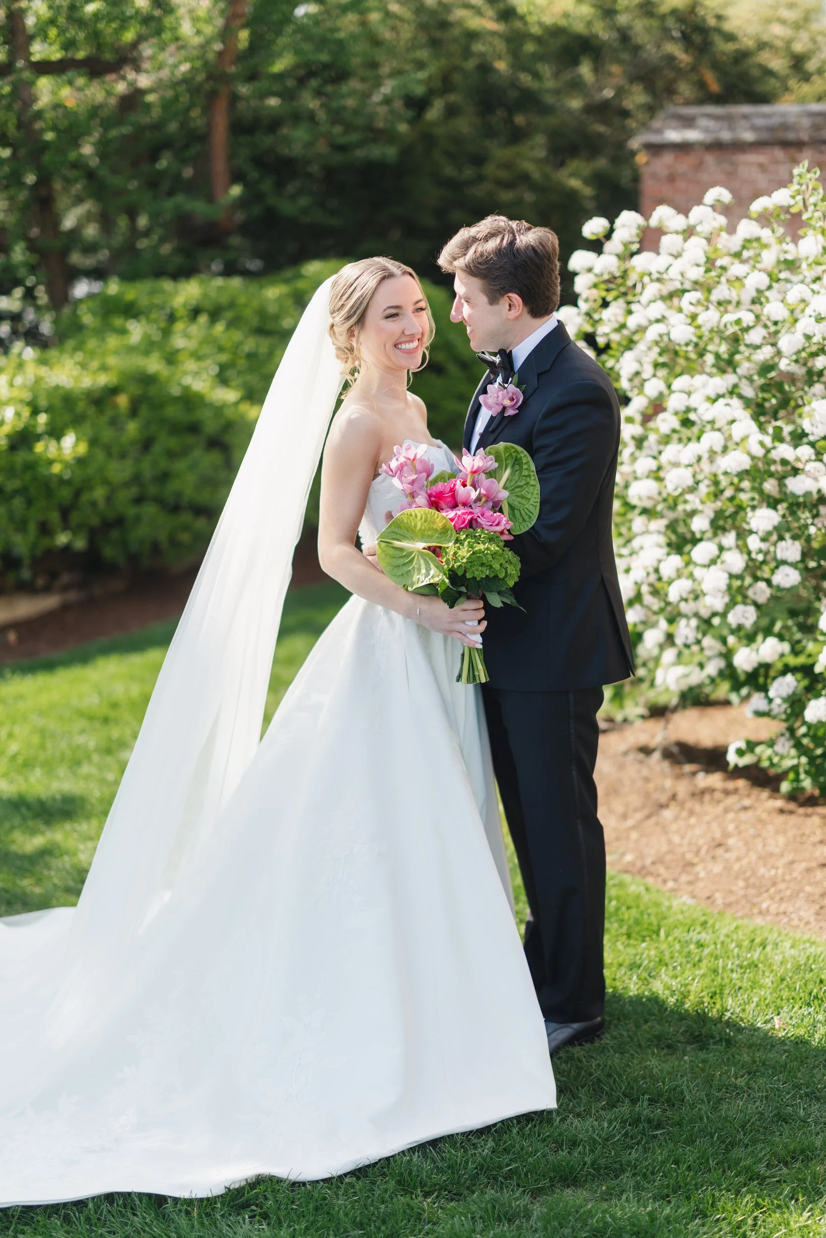 Elegant bride and groom portraits around Misselwood Estate grounds