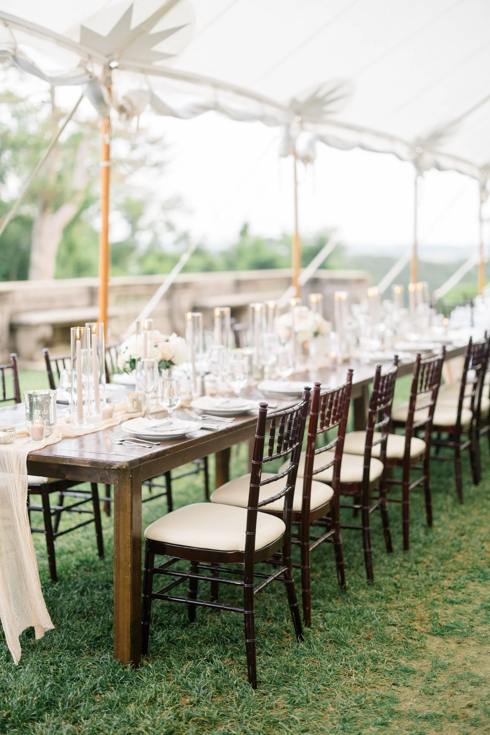 Elegant place settings and floral centerpieces for a Castle Hill on the Crane Estate reception.