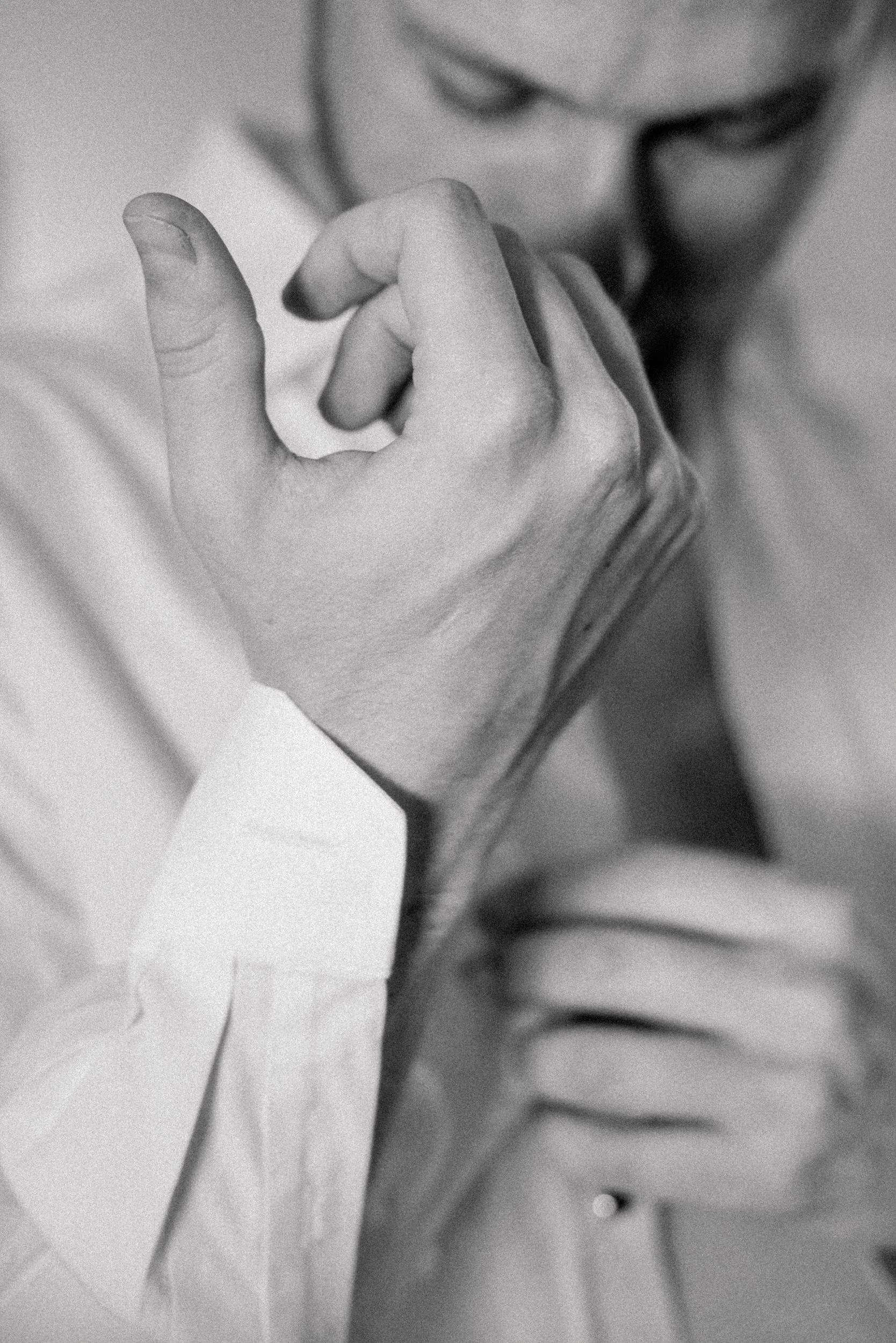 Classic groom portrait during preparation wearing black tuxedo and bow tie for New England estate wedding