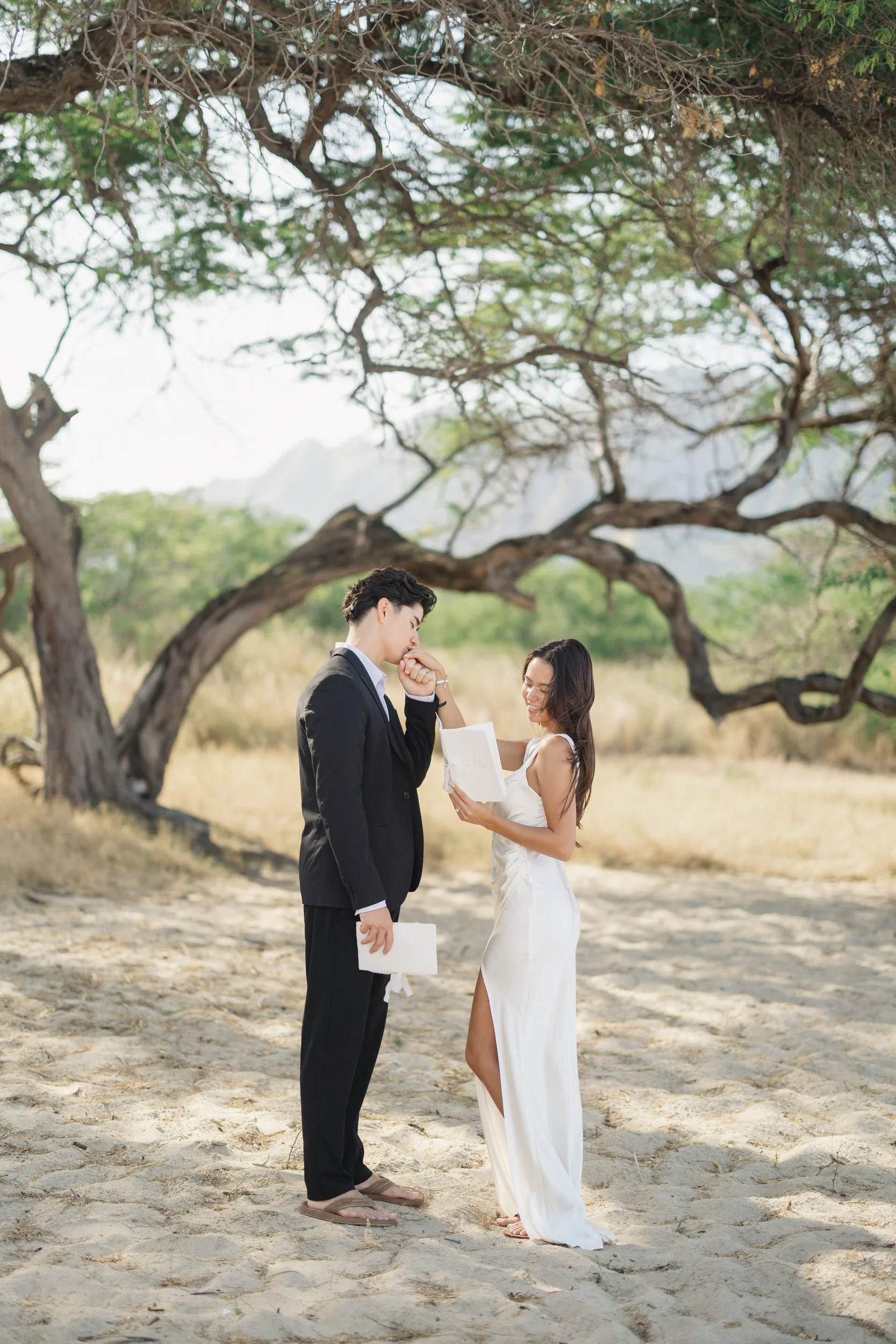 Emotional vow exchange during Oahu destination elopement ceremony