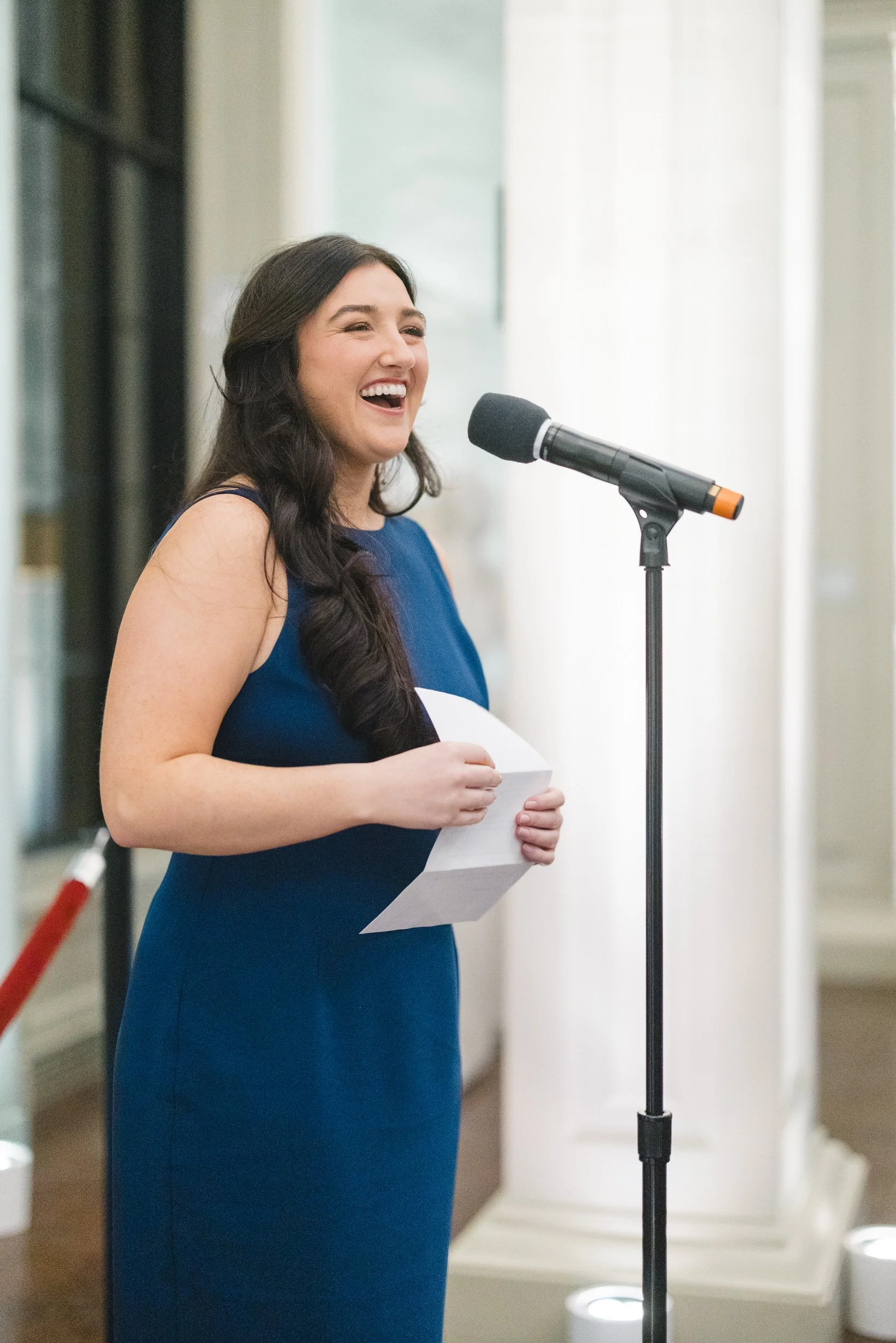 Emotional speech during a candlelit rehearsal dinner at the Boston Athenaeum