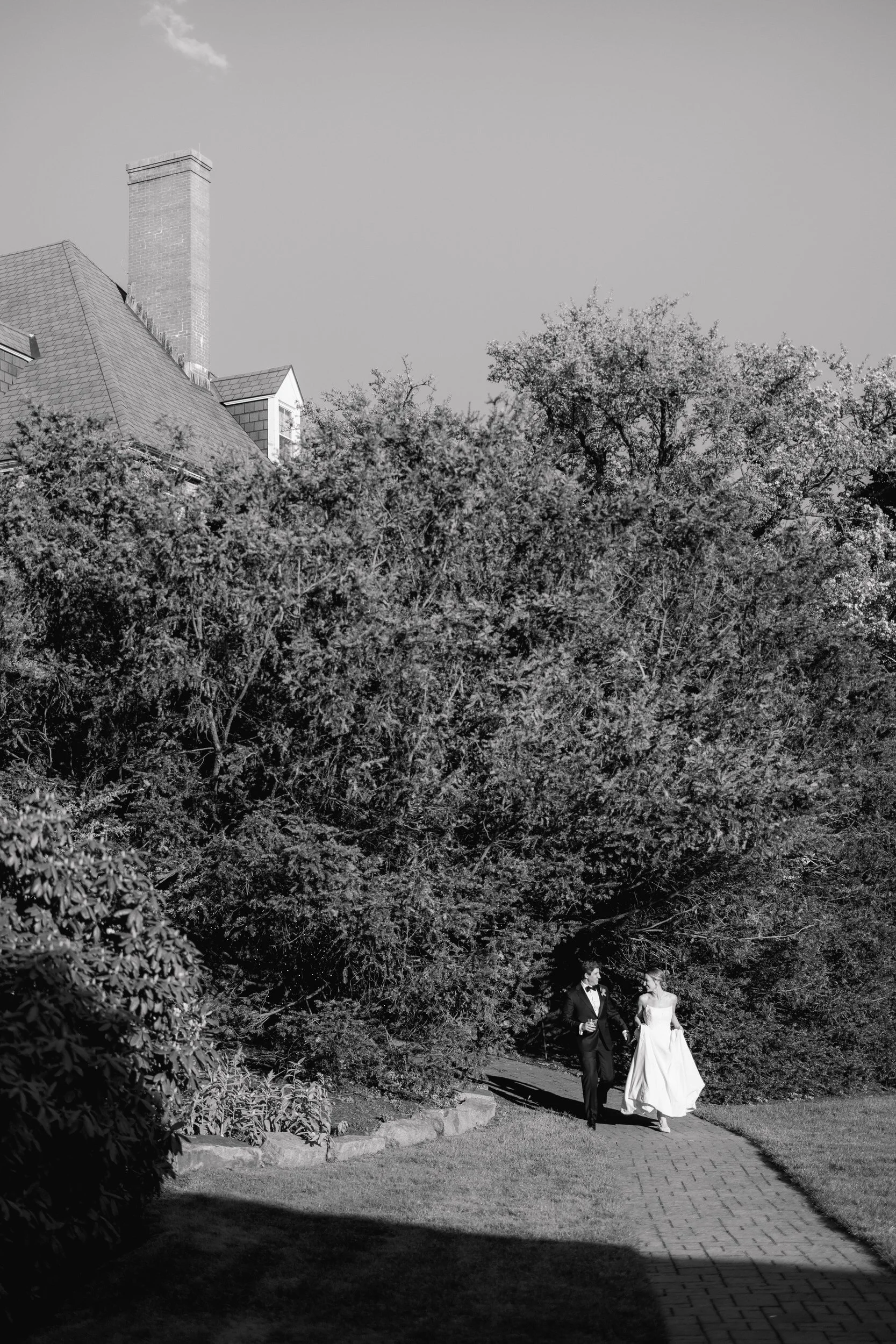 Bride and groom portraits during golden hour at oceanfront Massachusetts wedding
