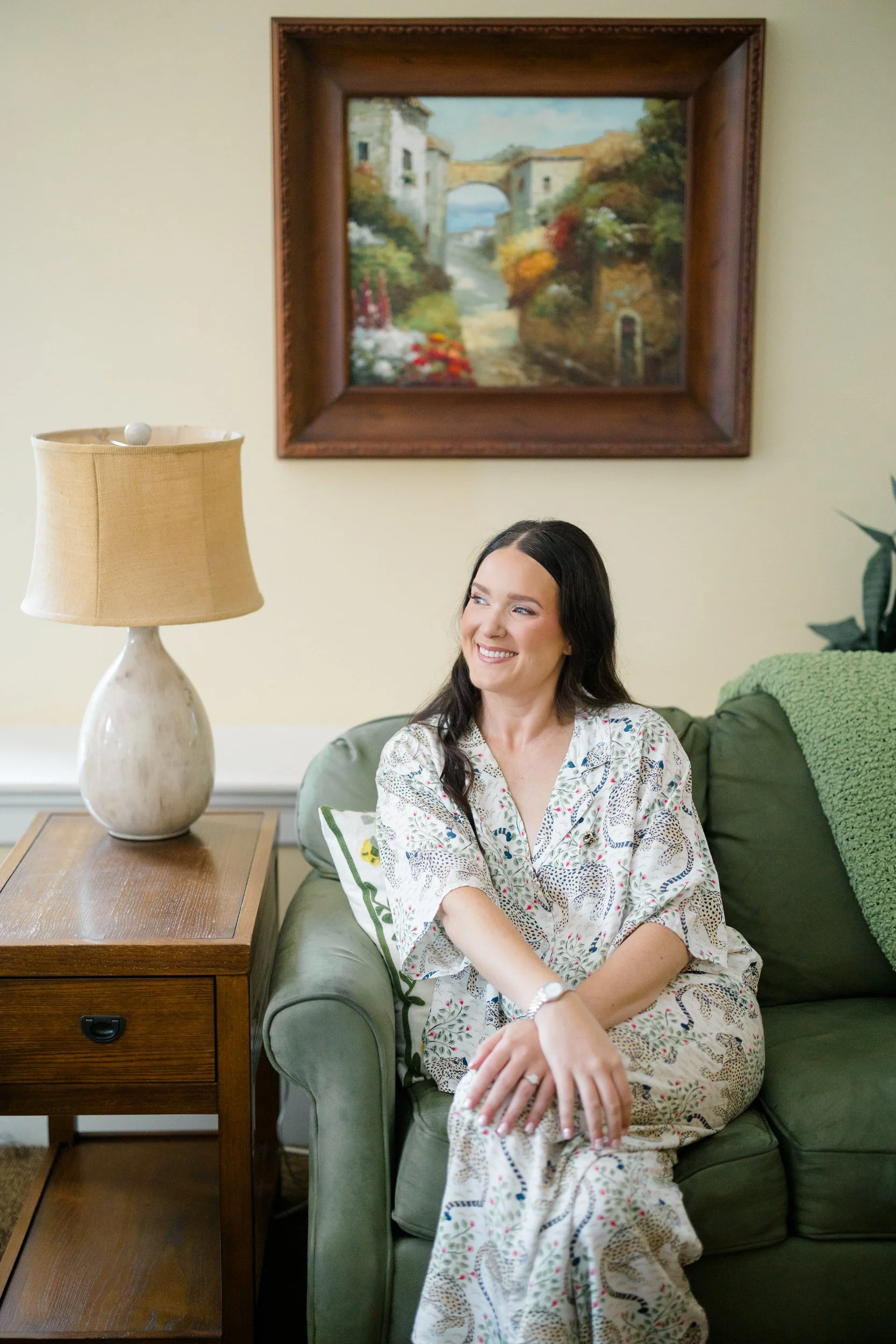 Bride getting dressed for a whimsical garden wedding filled with bright seasonal blooms.