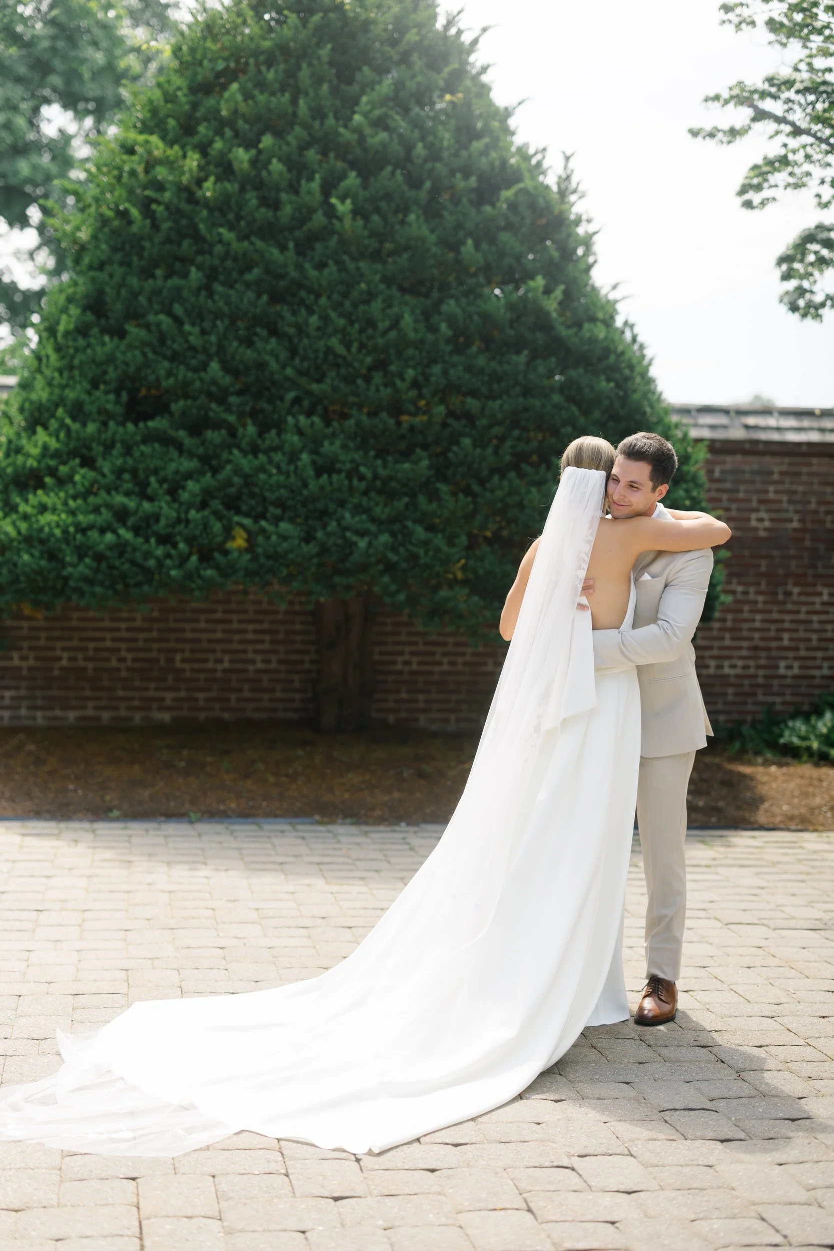 Groom seeing his bride for the first time before the ceremony.