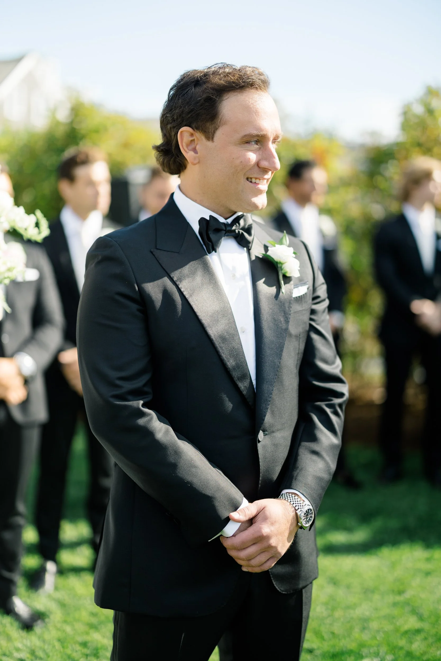 Outdoor wedding ceremony on the lawn at Wychmere Beach Club's Dune space.
