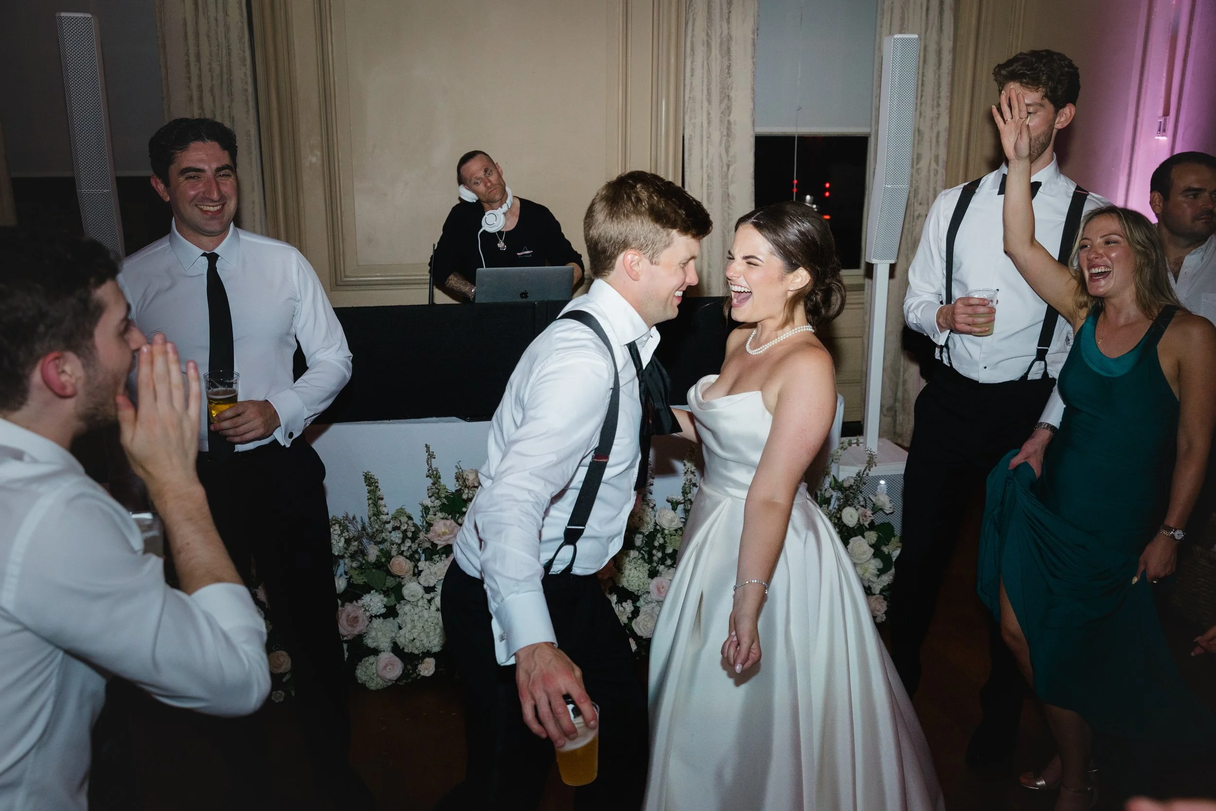 Guests dancing late into the night during a joyful wedding celebration at Castle Hill on the Crane Estate.