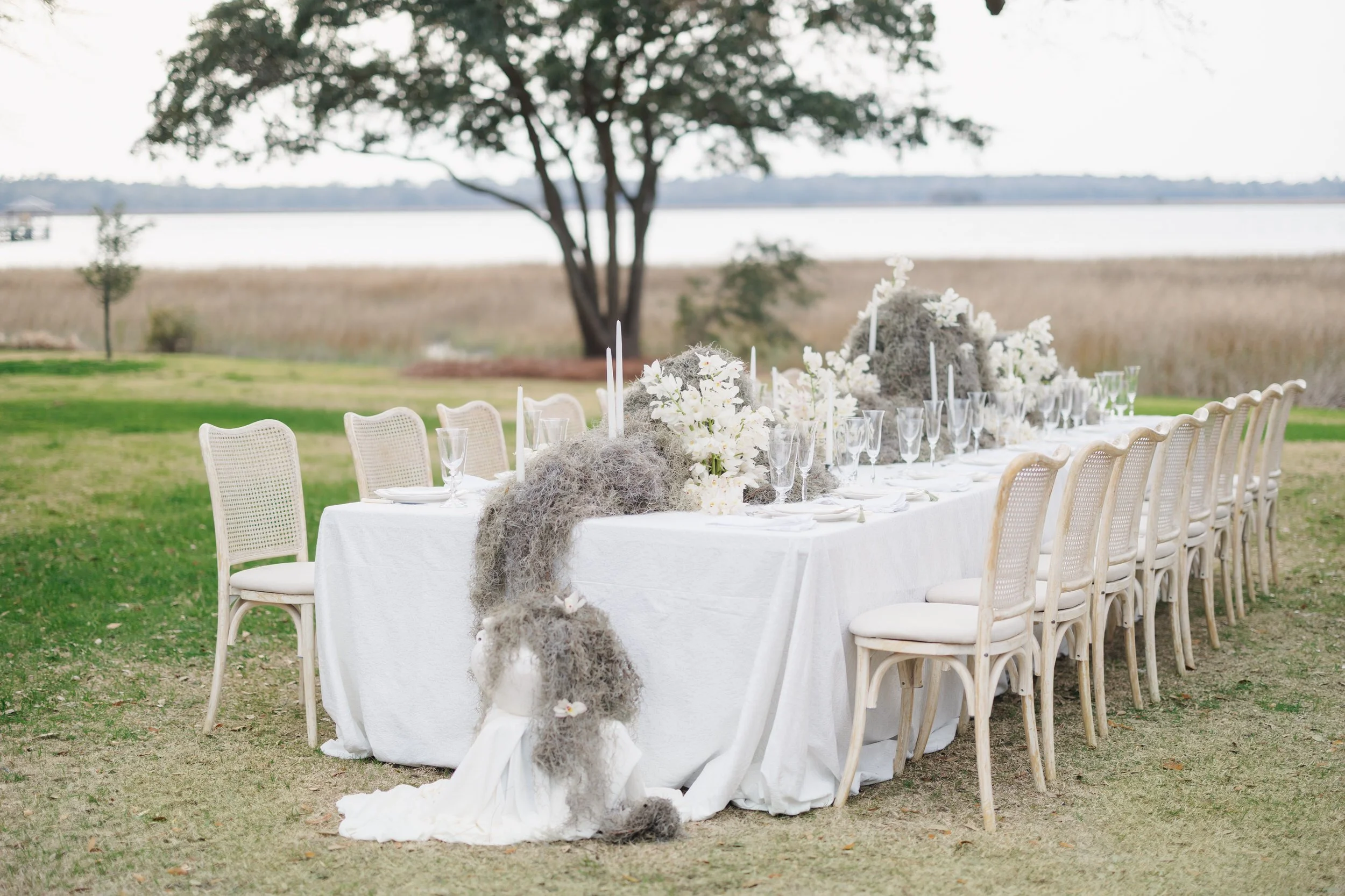 Elegant outdoor wedding reception tablescape at Lowndes Grove in Charleston