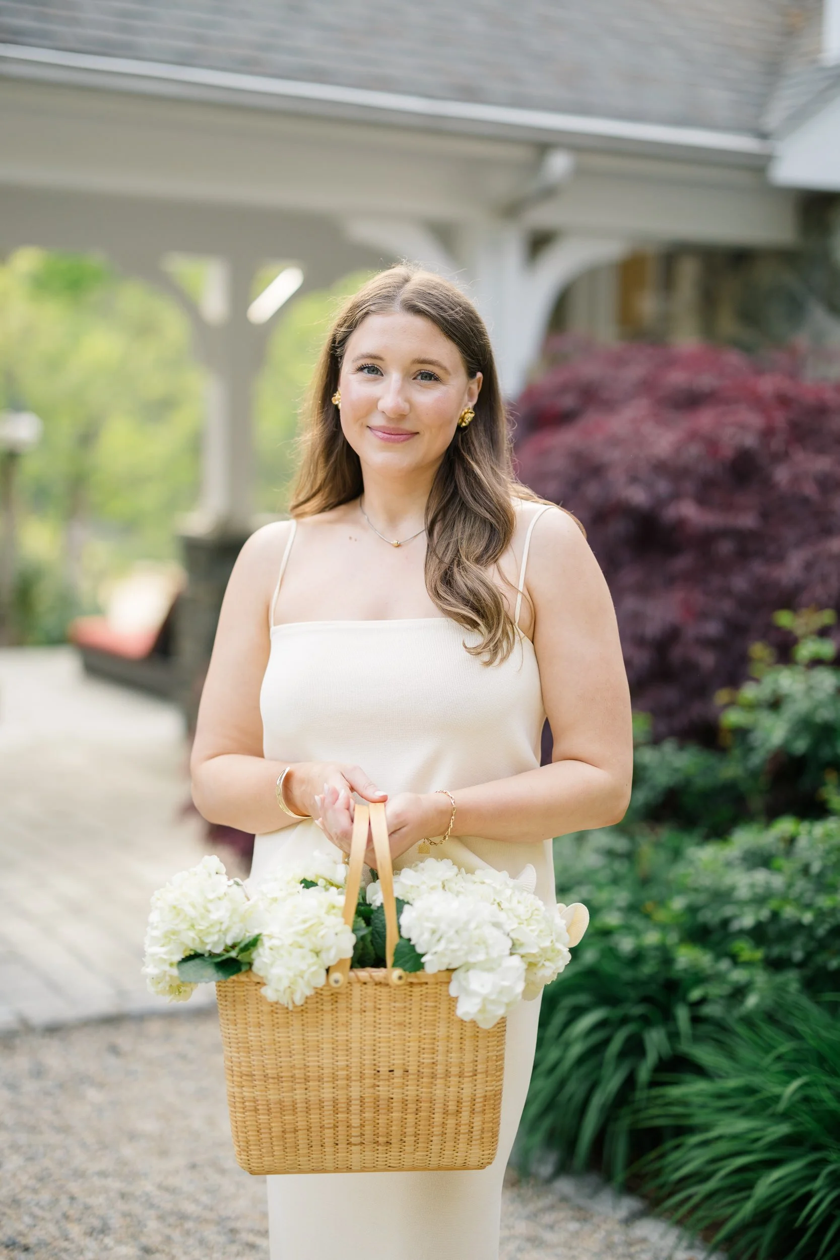 Romantic Cape Cod engagement session at a coastal cottage in Chatham featuring relaxed, elevated coastal chic styling.