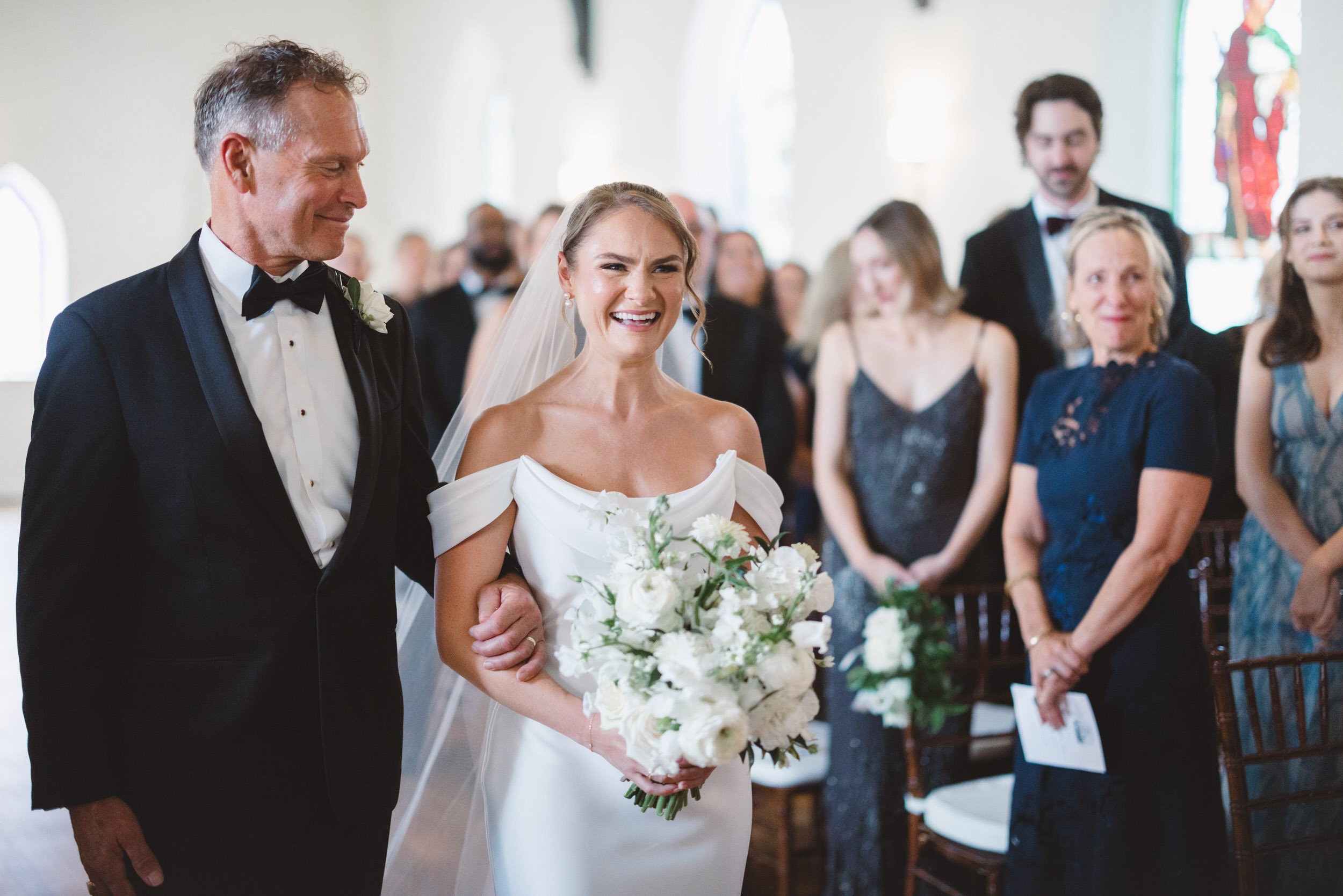Indoor chapel wedding ceremony before a Rosecliff reception