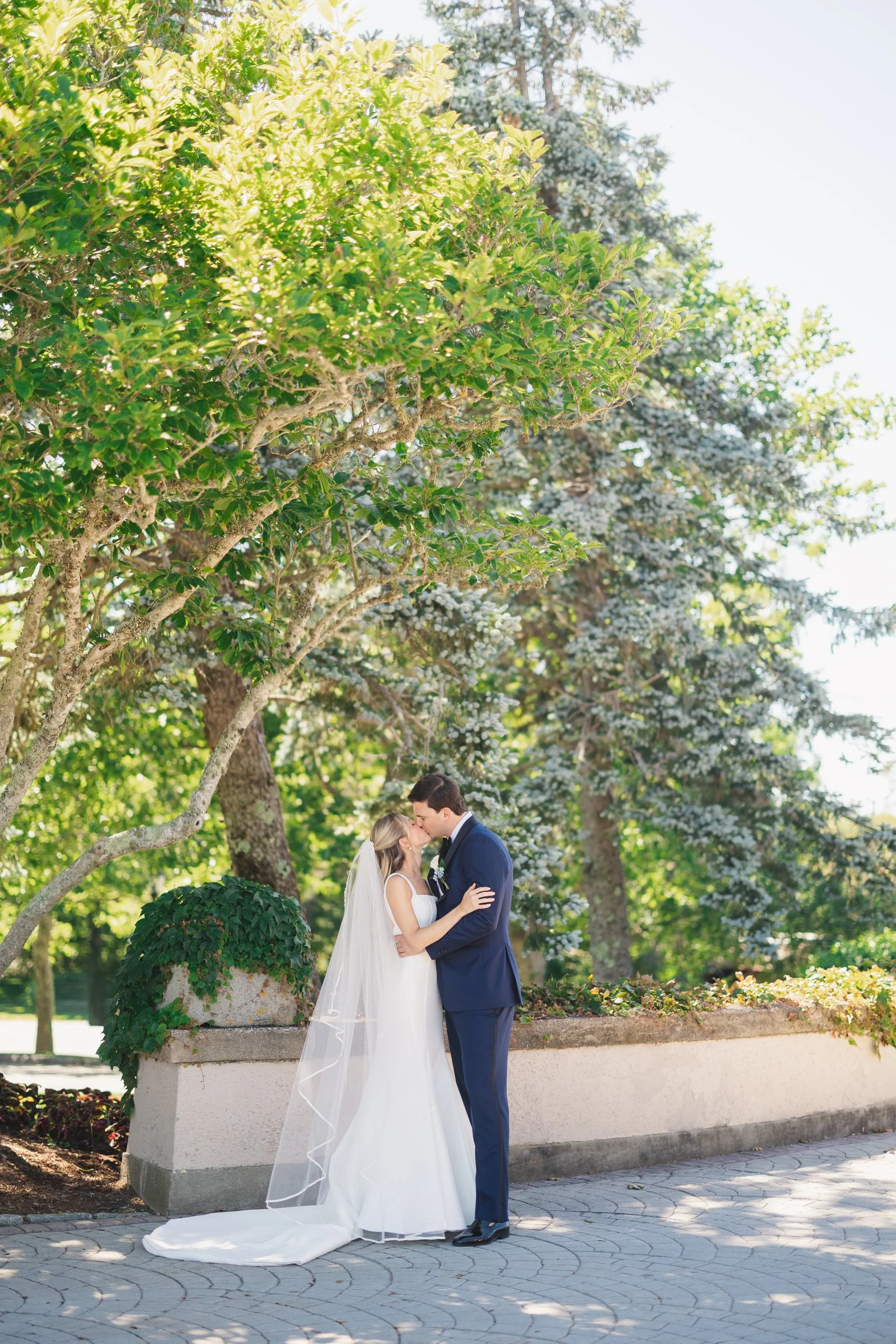 Bride and groom portraits overlooking the Cape Cod coastline