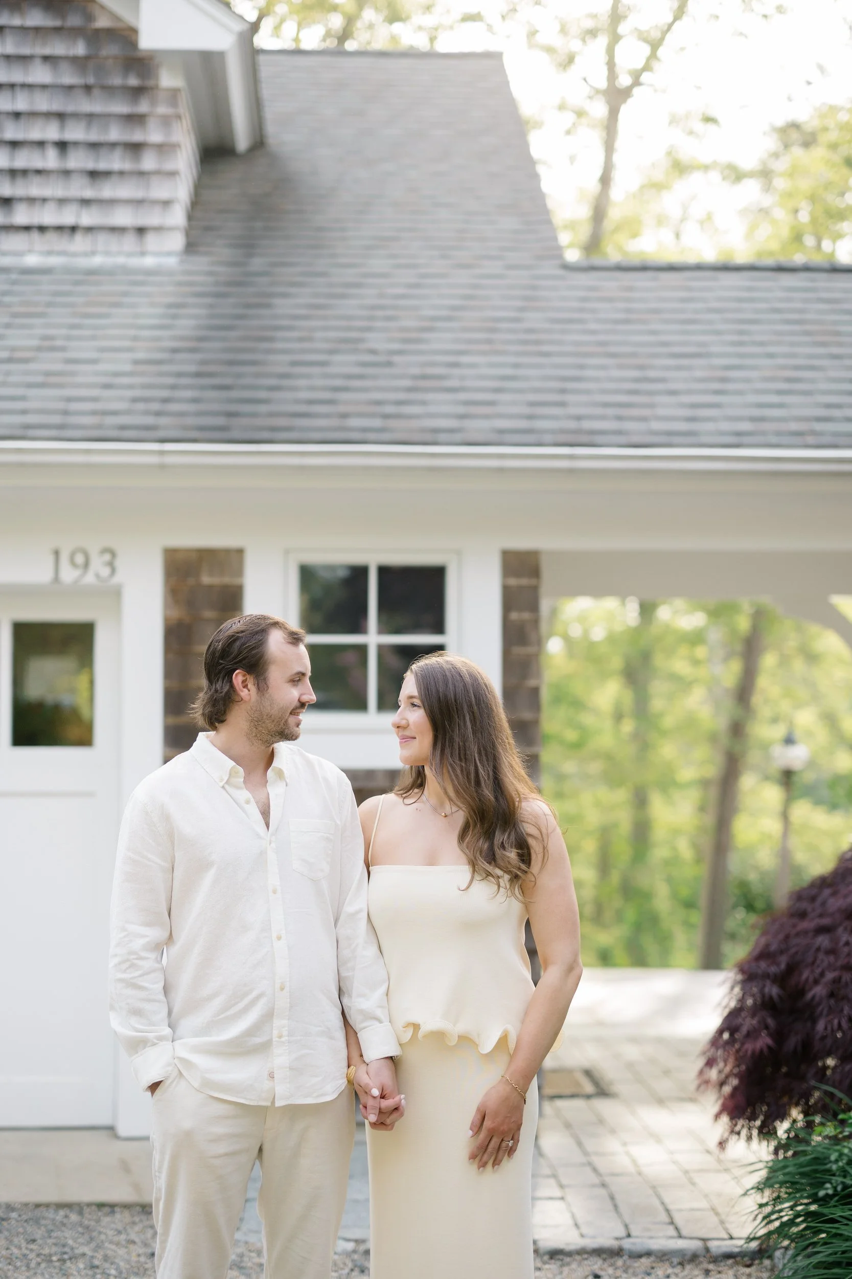 Editorial Cape Cod engagement session at a seaside cottage in Chatham Cape Cod with timeless coastal chic atmosphere.