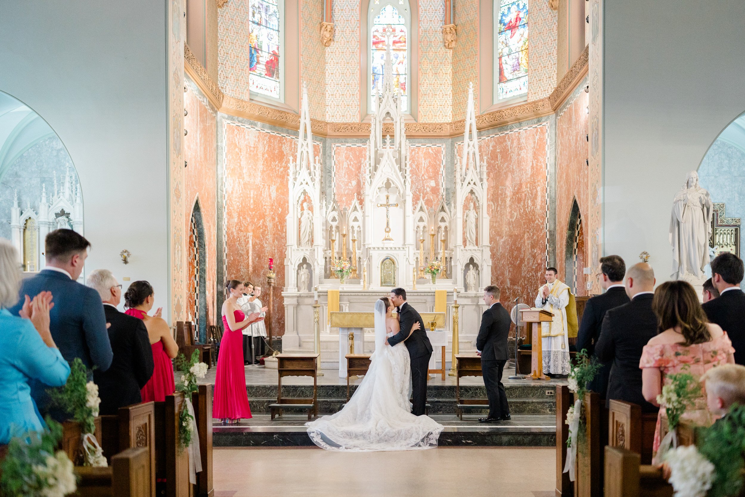 First kiss during a Catholic wedding ceremony in New Bedford.