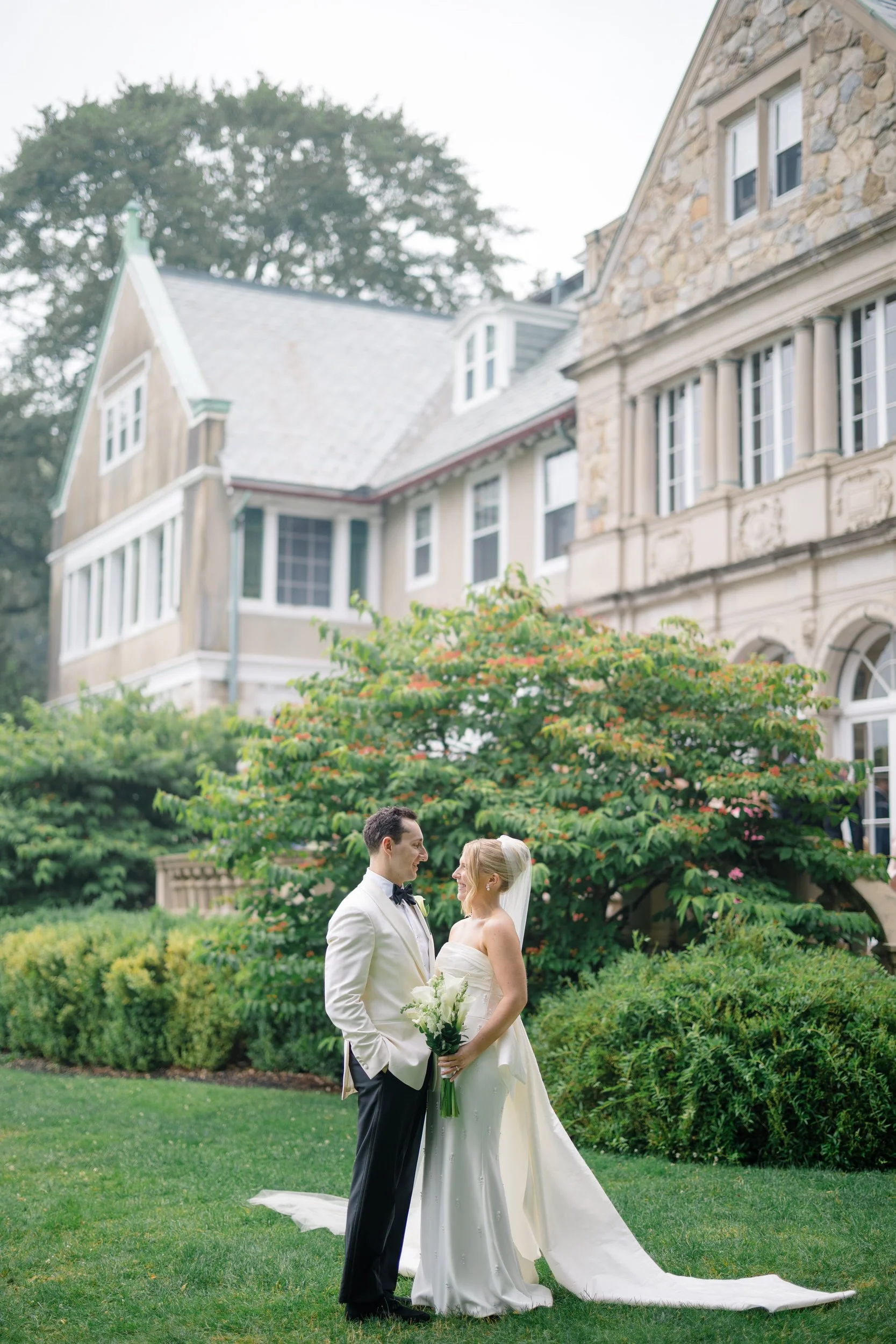 Romantic sunset portraits in the gardens at Blithewold Mansion after the rain.