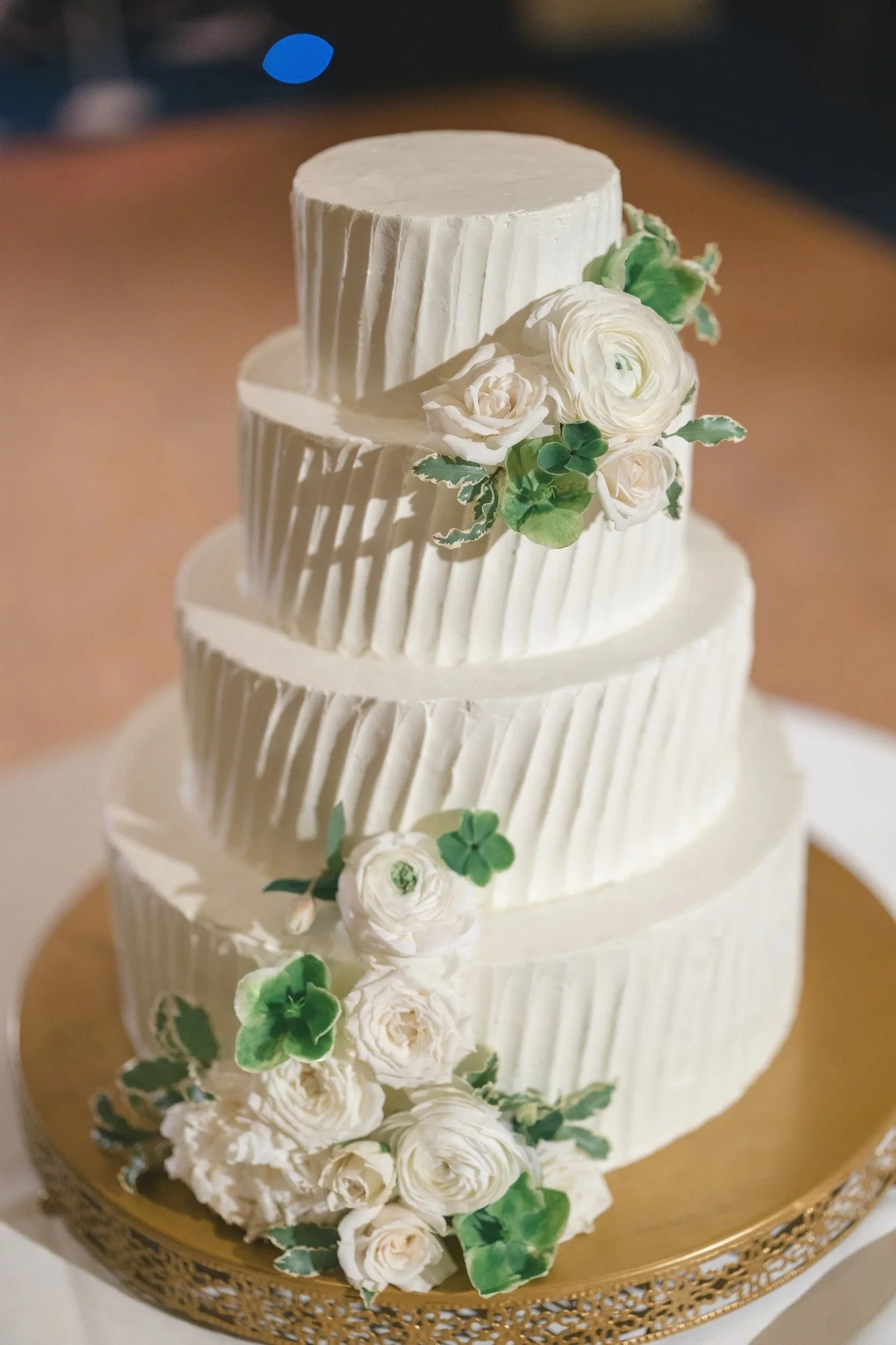 Wedding cake cutting during a Boston Harbor Hotel reception