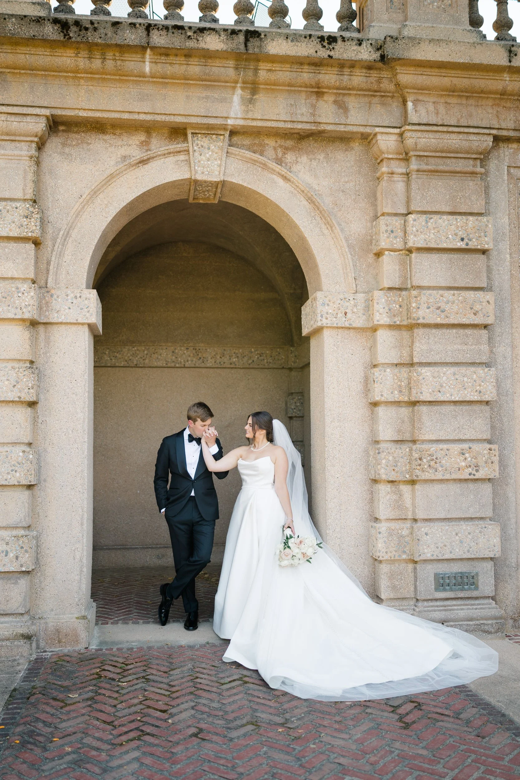 Editorial portraits of the couple in front of the historic Great House at Castle Hill on the Crane Estate.