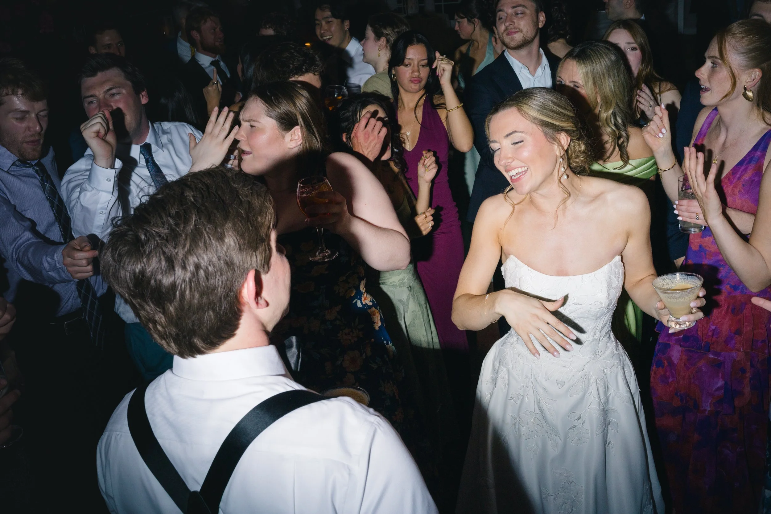 Candid reception dancing photographed in documentary style