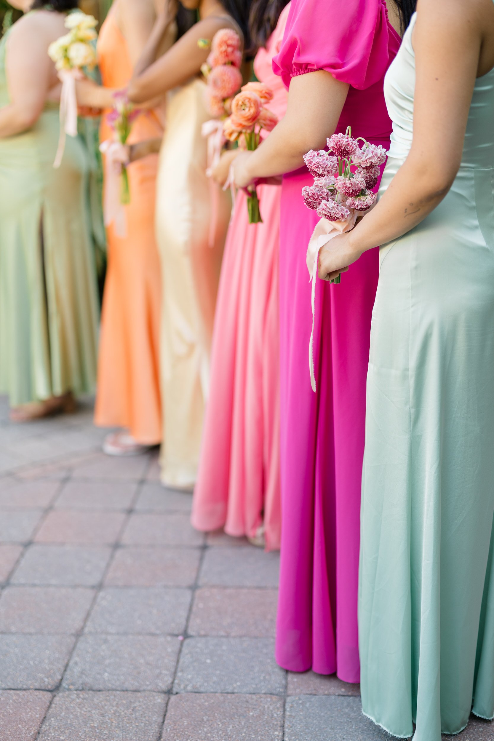 Colorful garden wedding ceremony surrounded by lush florals and greenery in Topsfield MA