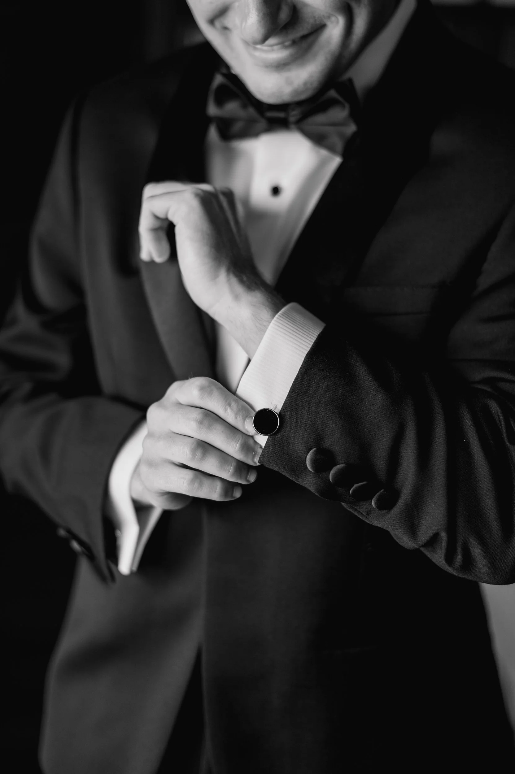 Groom preparation moments captured at this North Shore wedding in Marblehead overlooking the harbor.