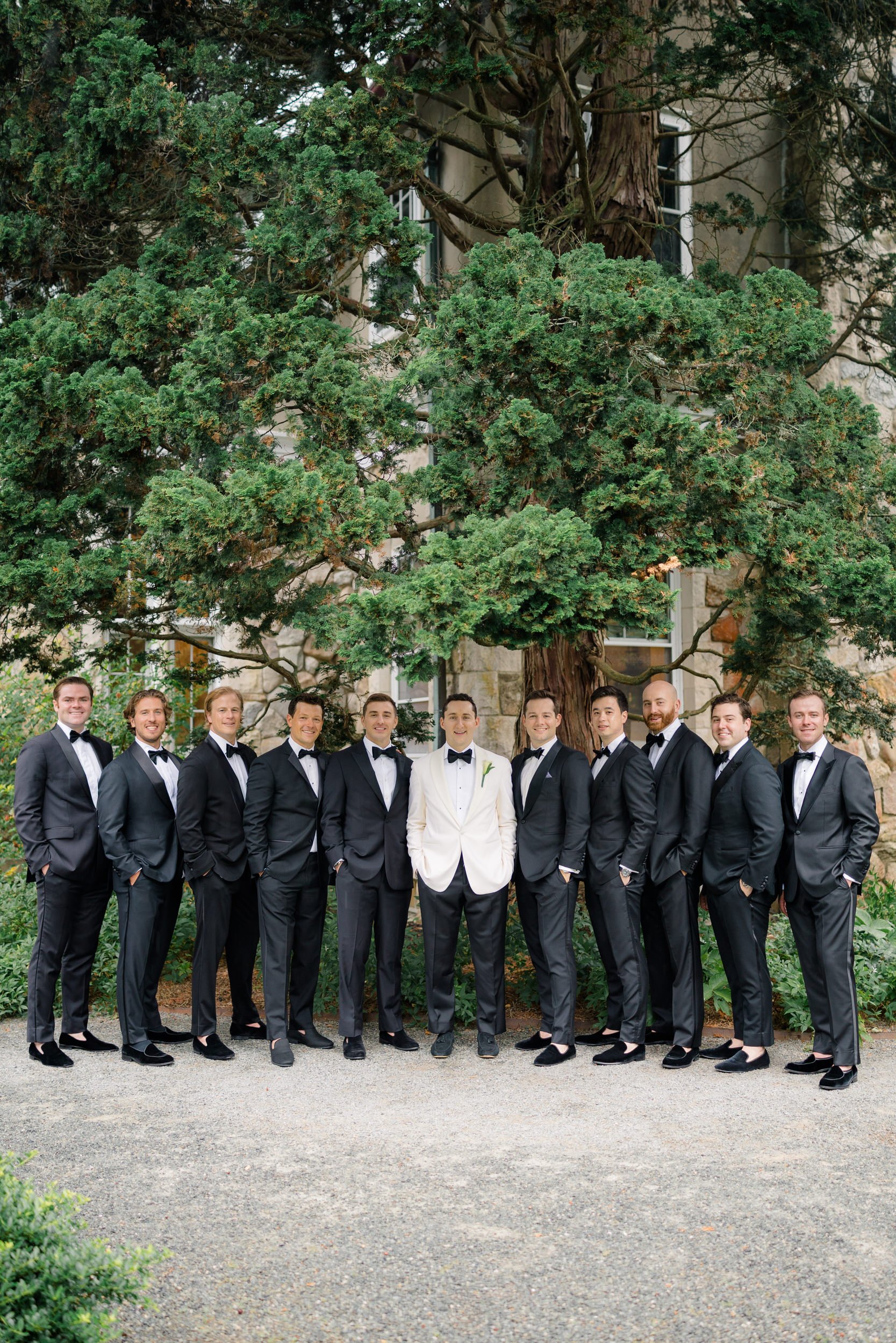 Groomsmen portraits in the gardens at Blithewold Mansion & Gardens.