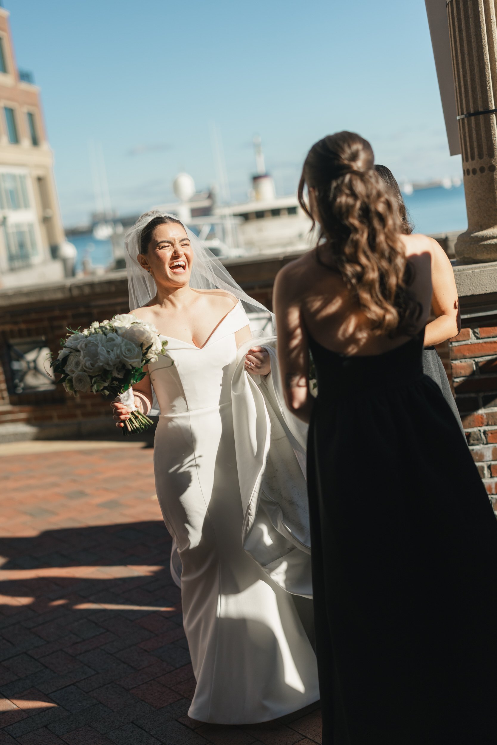 Fun, candid bridal party moments at a Boston Harbor Hotel wedding