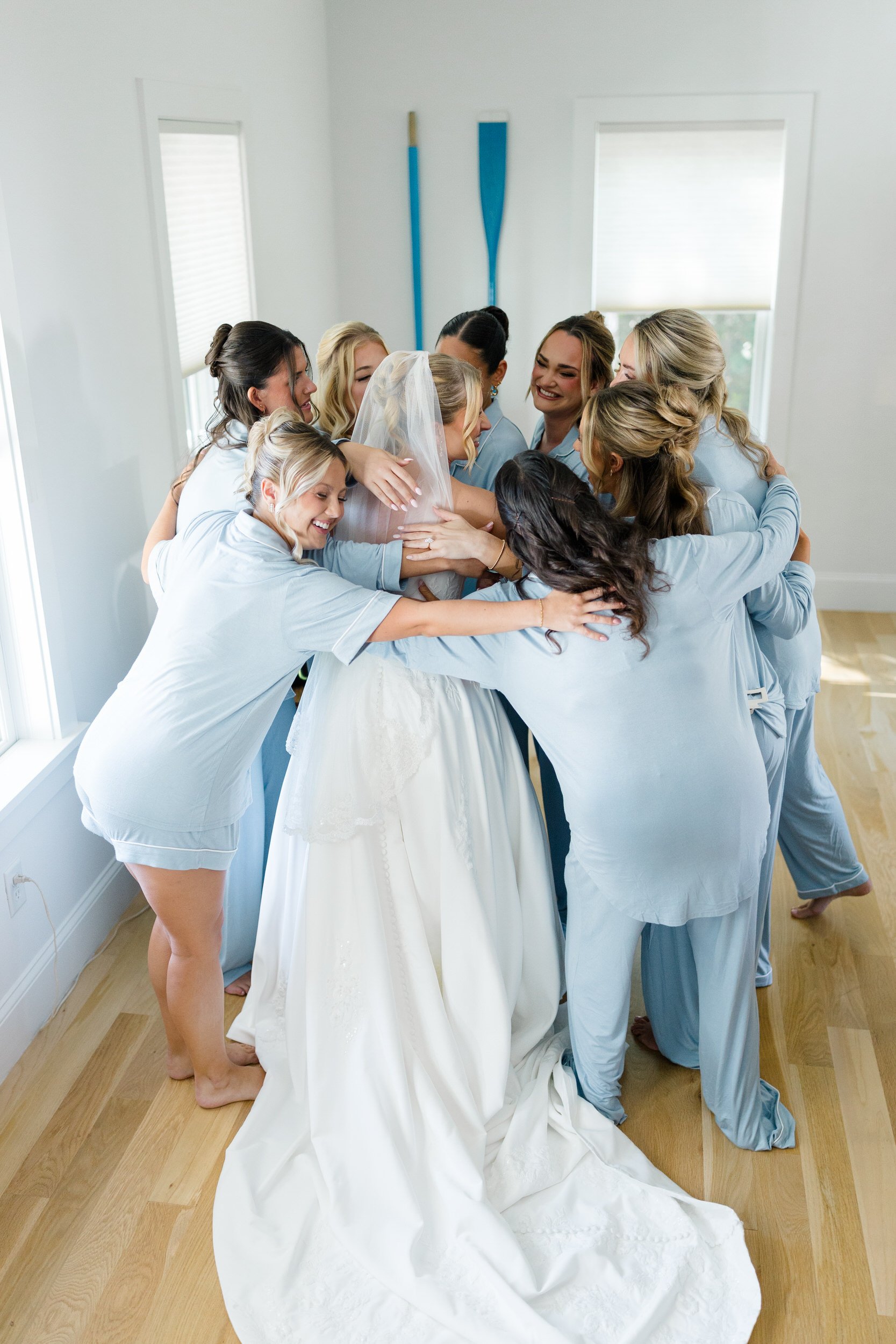 Documentary wedding photography capturing bridesmaids first look during bridal preparations on Cape Cod.