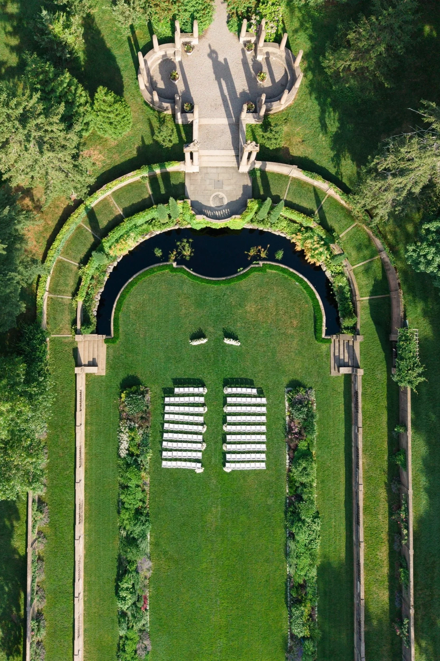 Drone shot of the Crane Estate Italian Garden revealing the full ceremony layout and estate grounds.