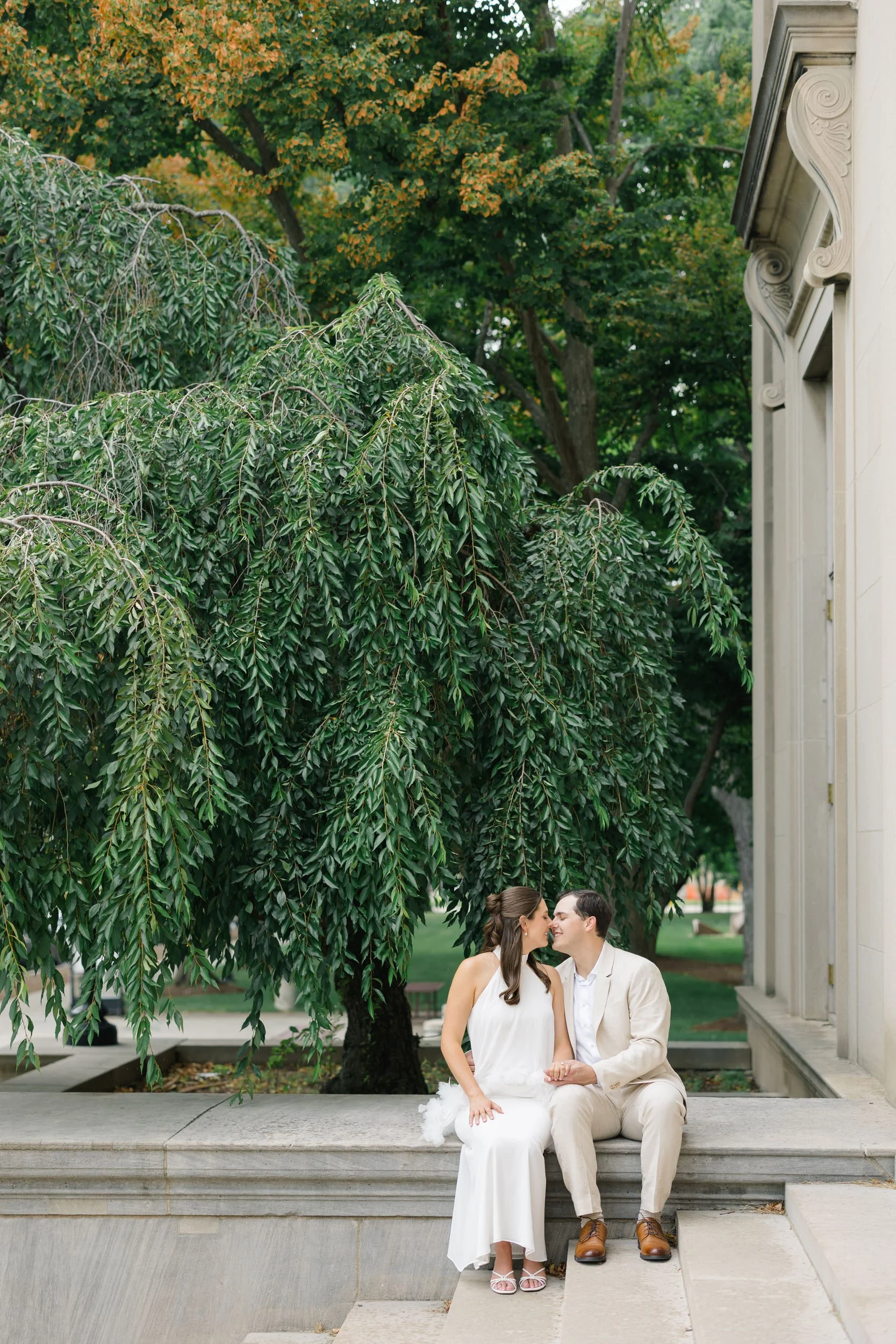 Timeless Cambridge engagement session featuring elegant marble columns.