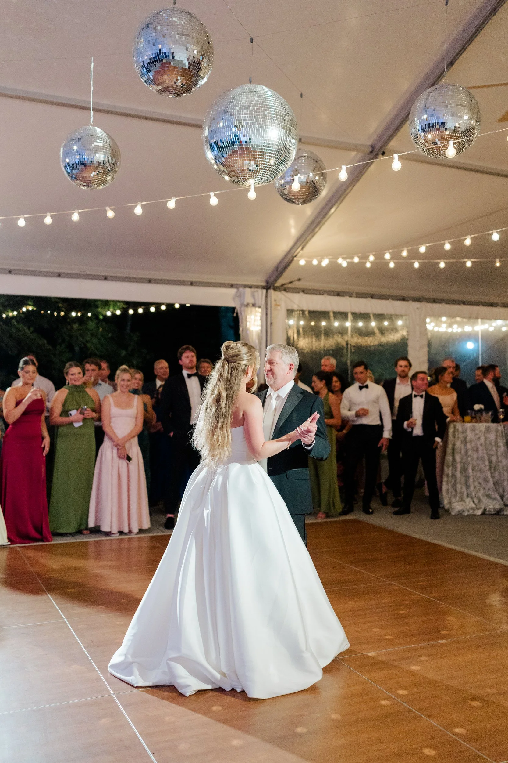 Friends and family dancing during an Italian garden wedding celebration