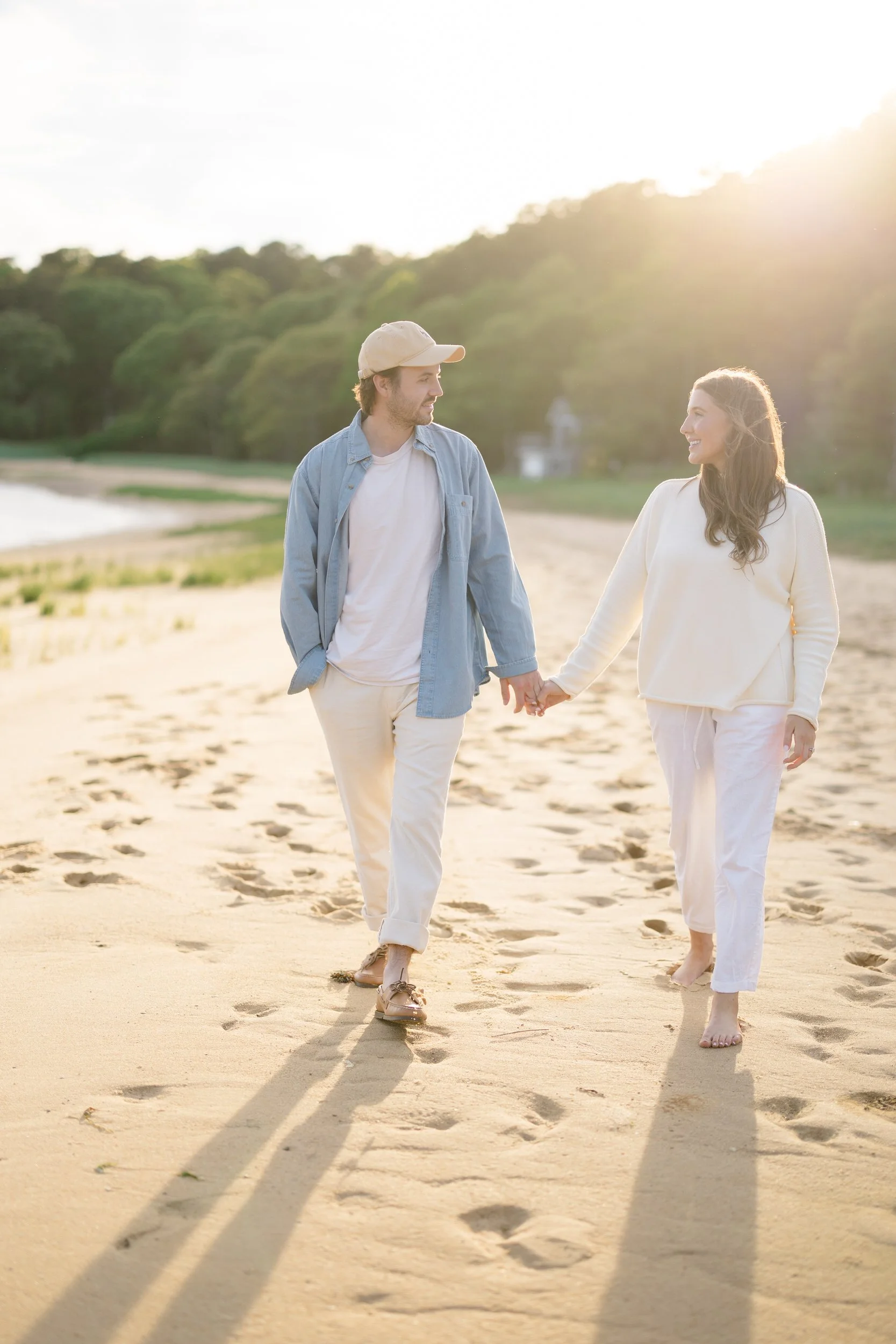 Chatham Cape Cod engagement session beach portraits with windblown hair and natural movement.