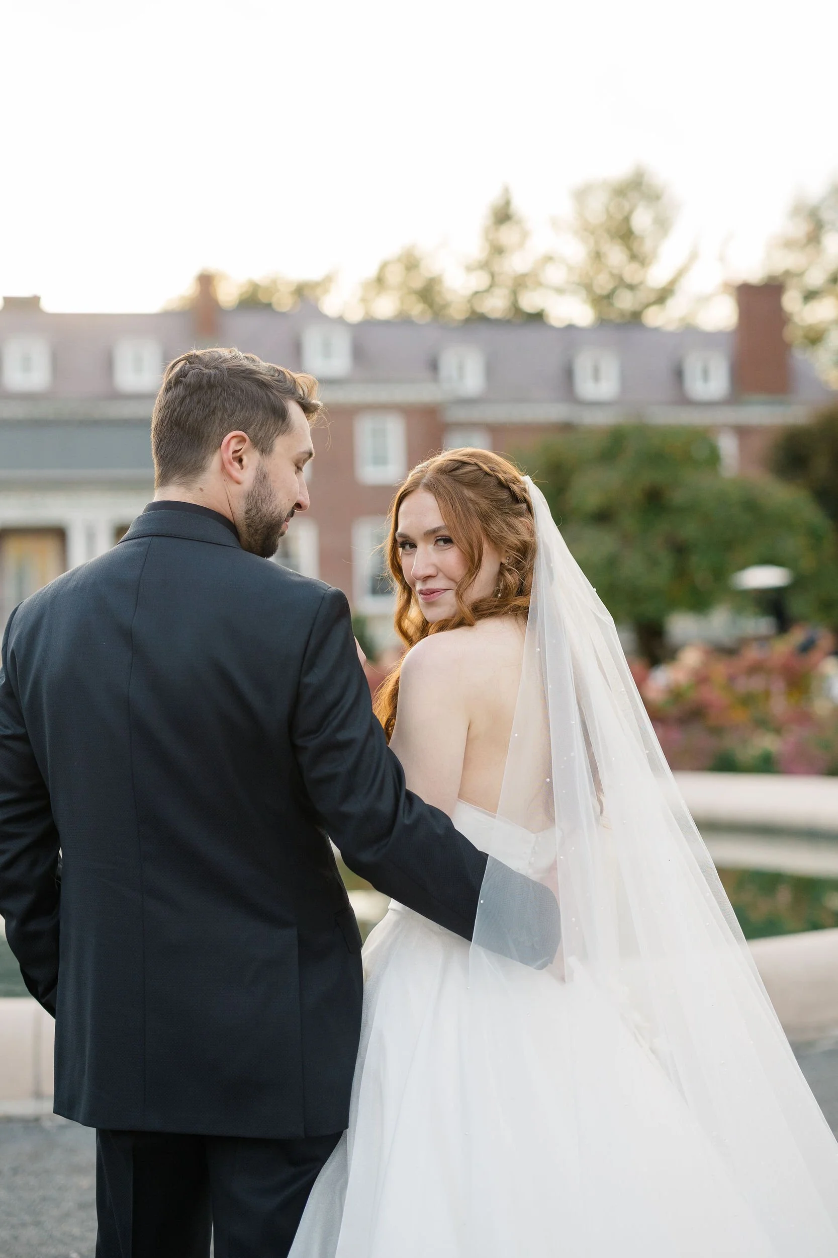 Romantic couple portraits at a secret garden inspired wedding in Massachusetts.