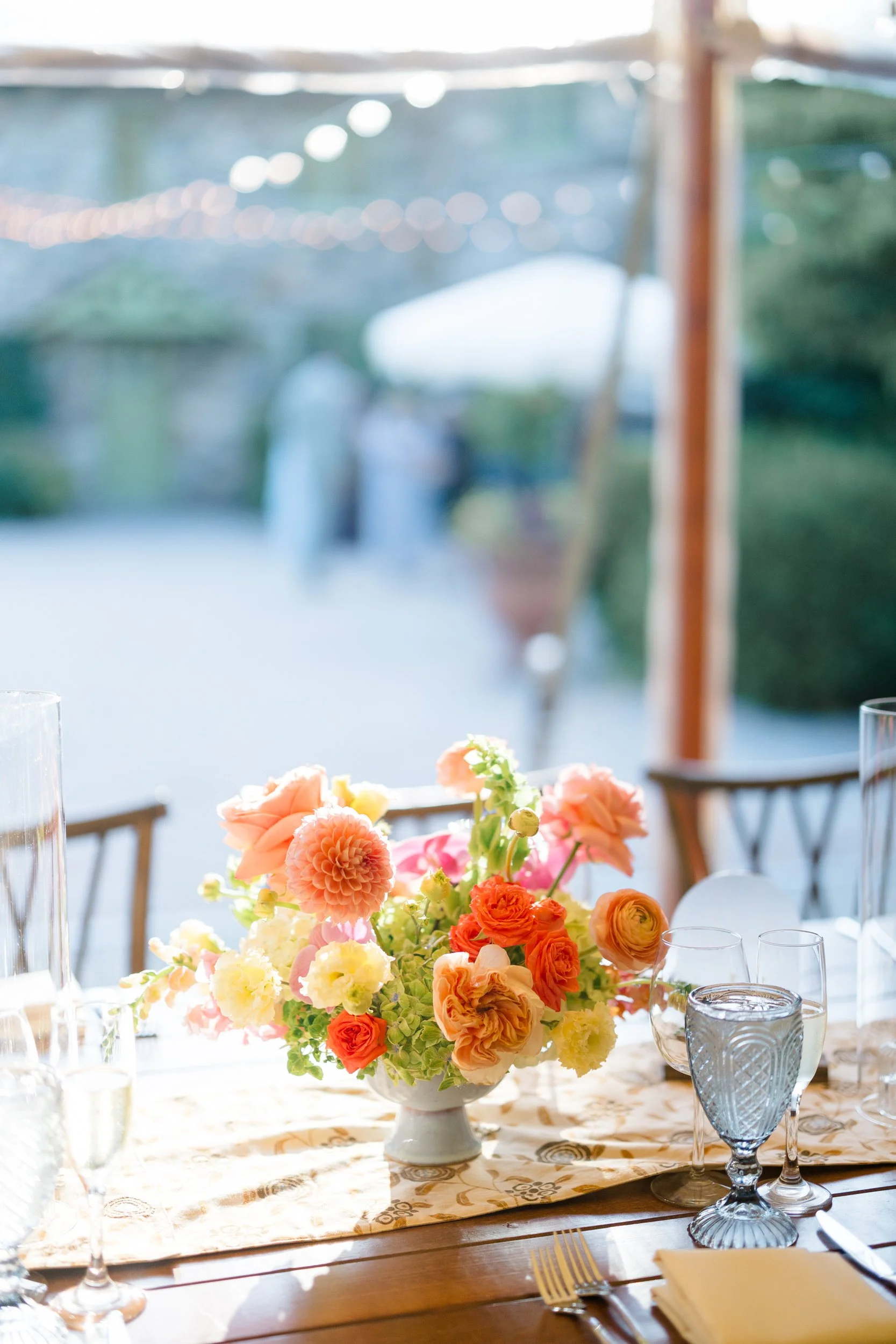Colorful wedding tablescape with pink orange and green floral design in Topsfield MA