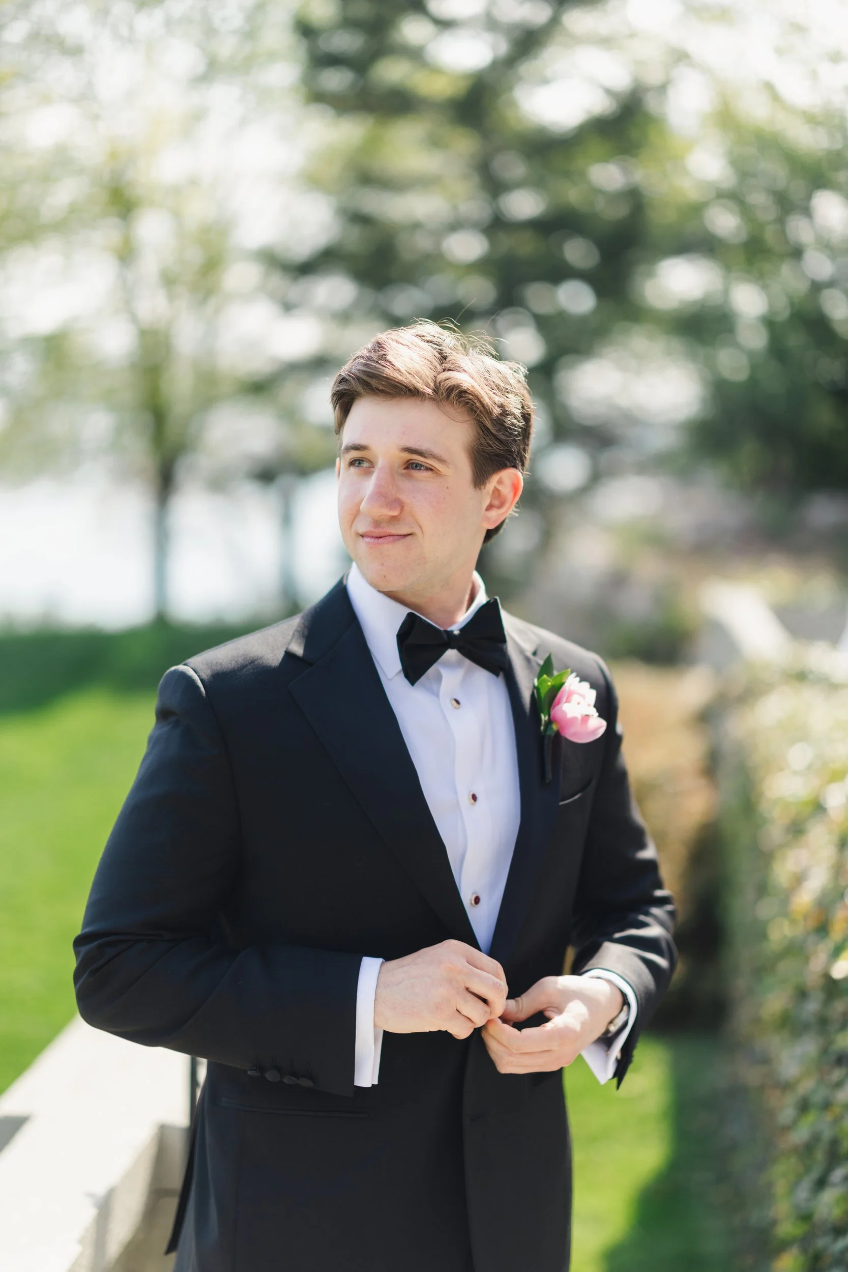 Elegant groom portraits at coastal Massachusetts wedding venue
