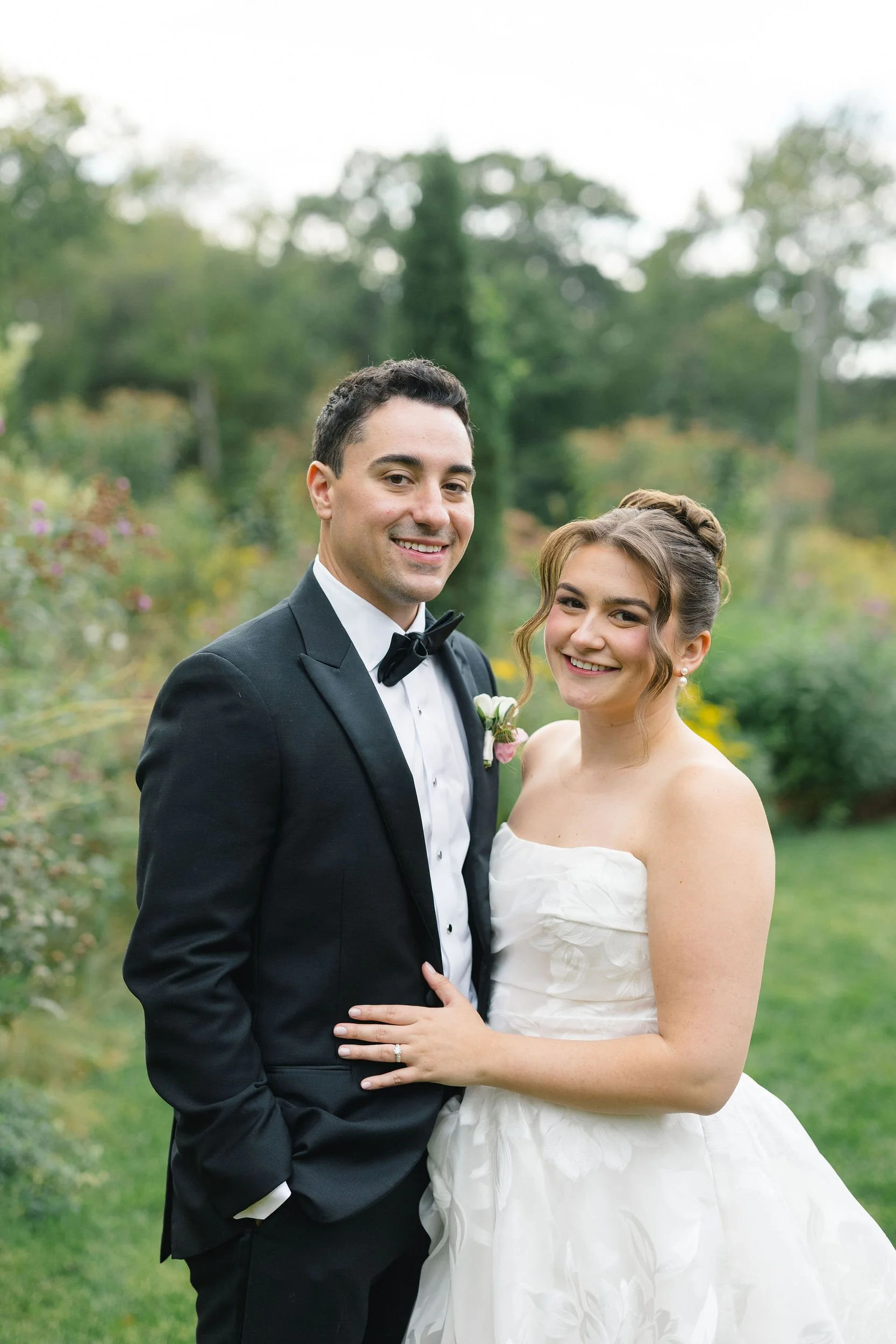 Sunset wedding portraits surrounded by greenery at the Long Hill estate.