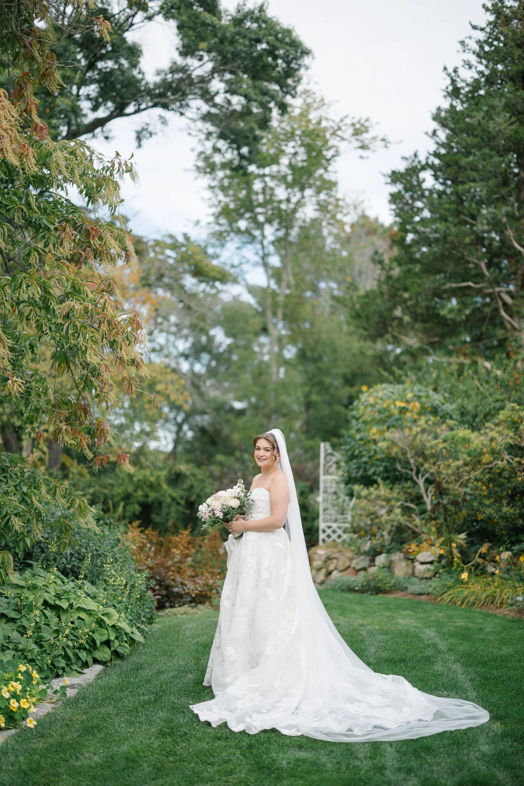 Bridal portraits photographed in the gardens at Long Hill in Beverly, Massachusetts.
