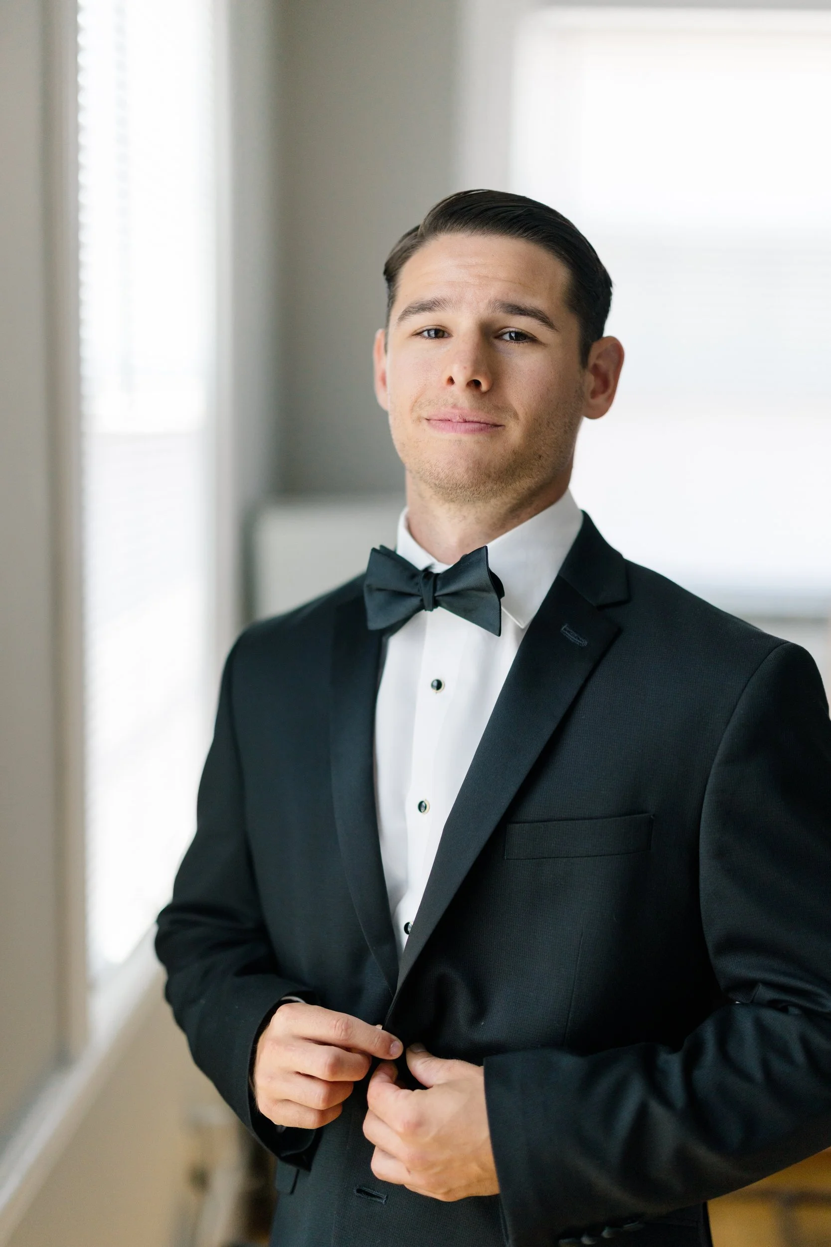 Groom preparing for his Cape Cod waterfront wedding